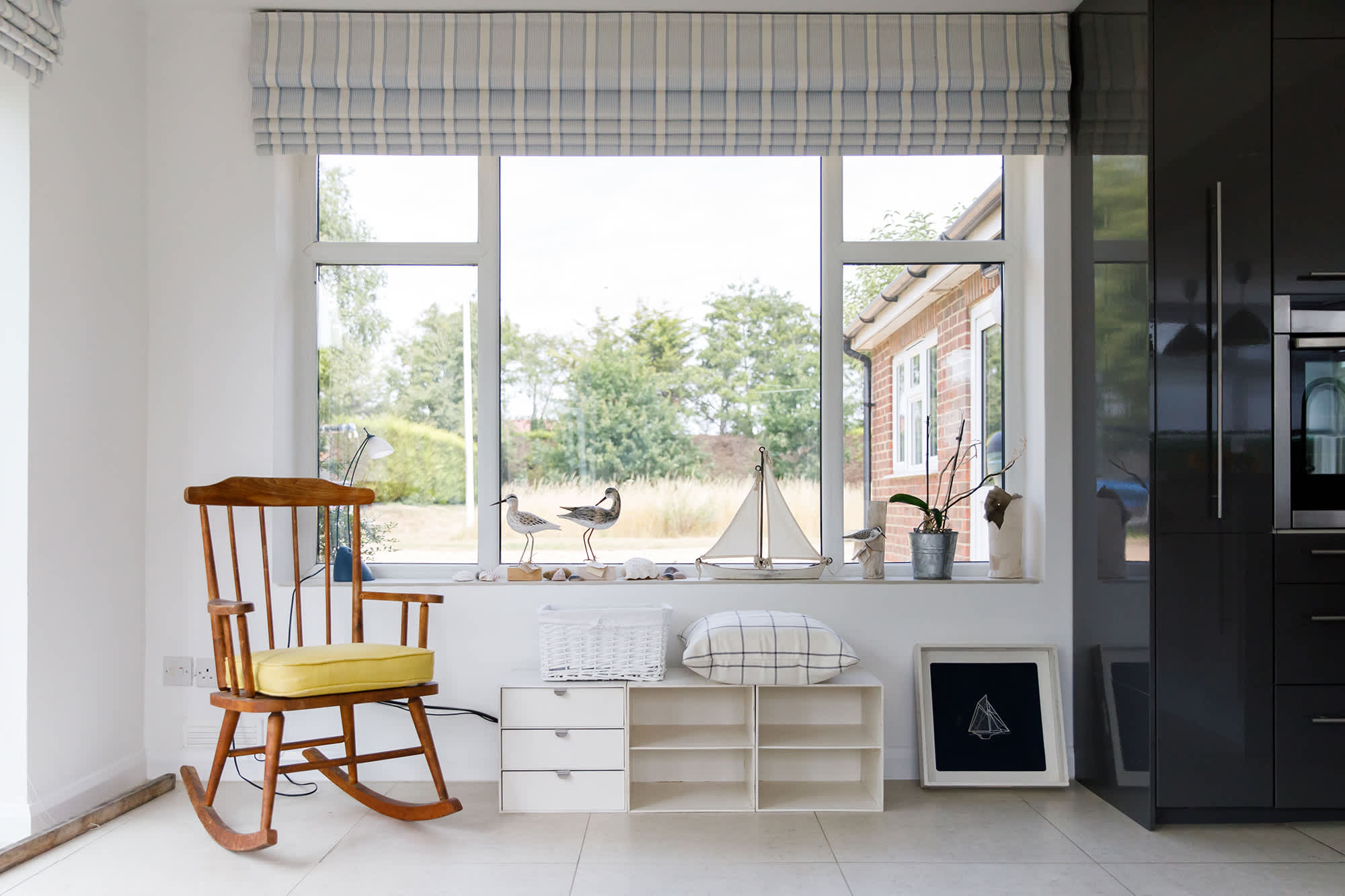 The large windows allow plenty of natural light into the house.