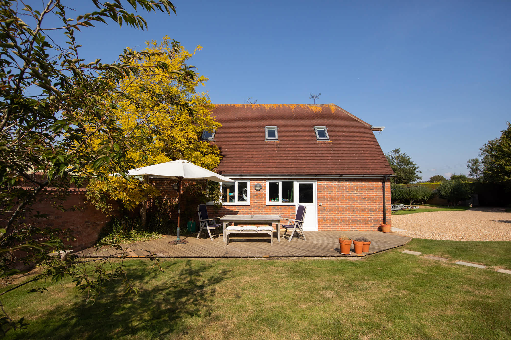 Enjoy the surrounding countryside, lawns and trees.