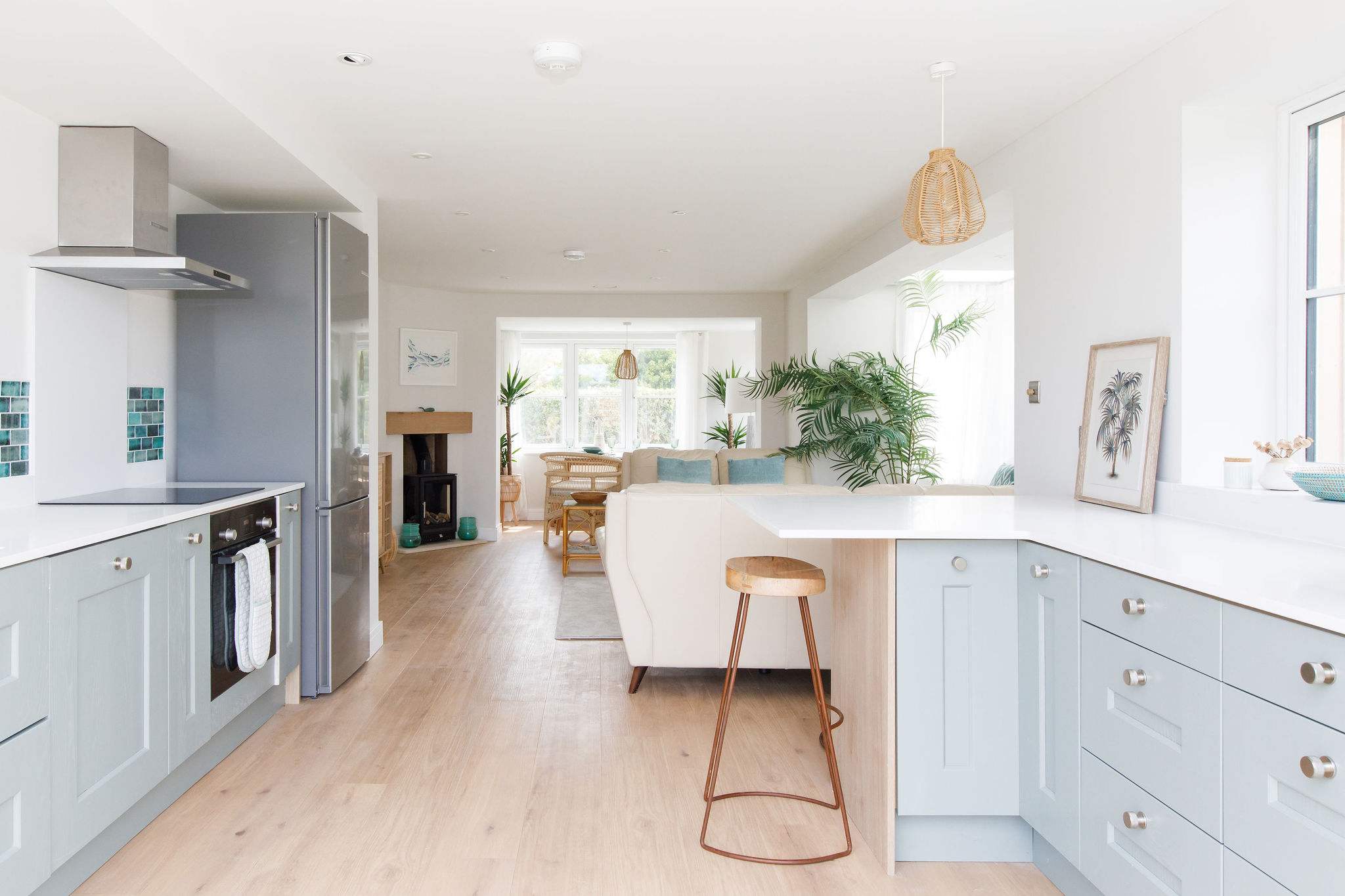 The open plan kitchen with breakfast bar