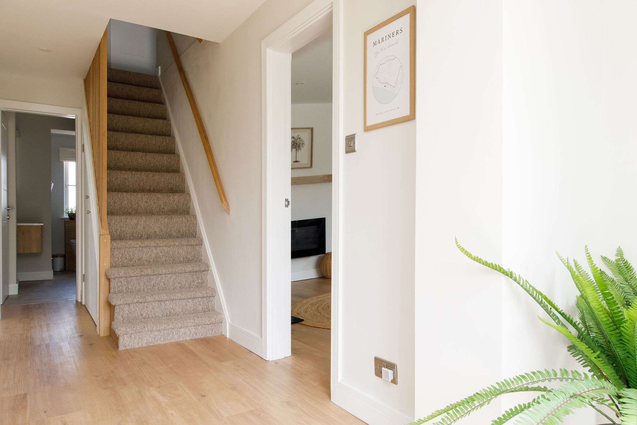 The hallway is light, bright and beautiful