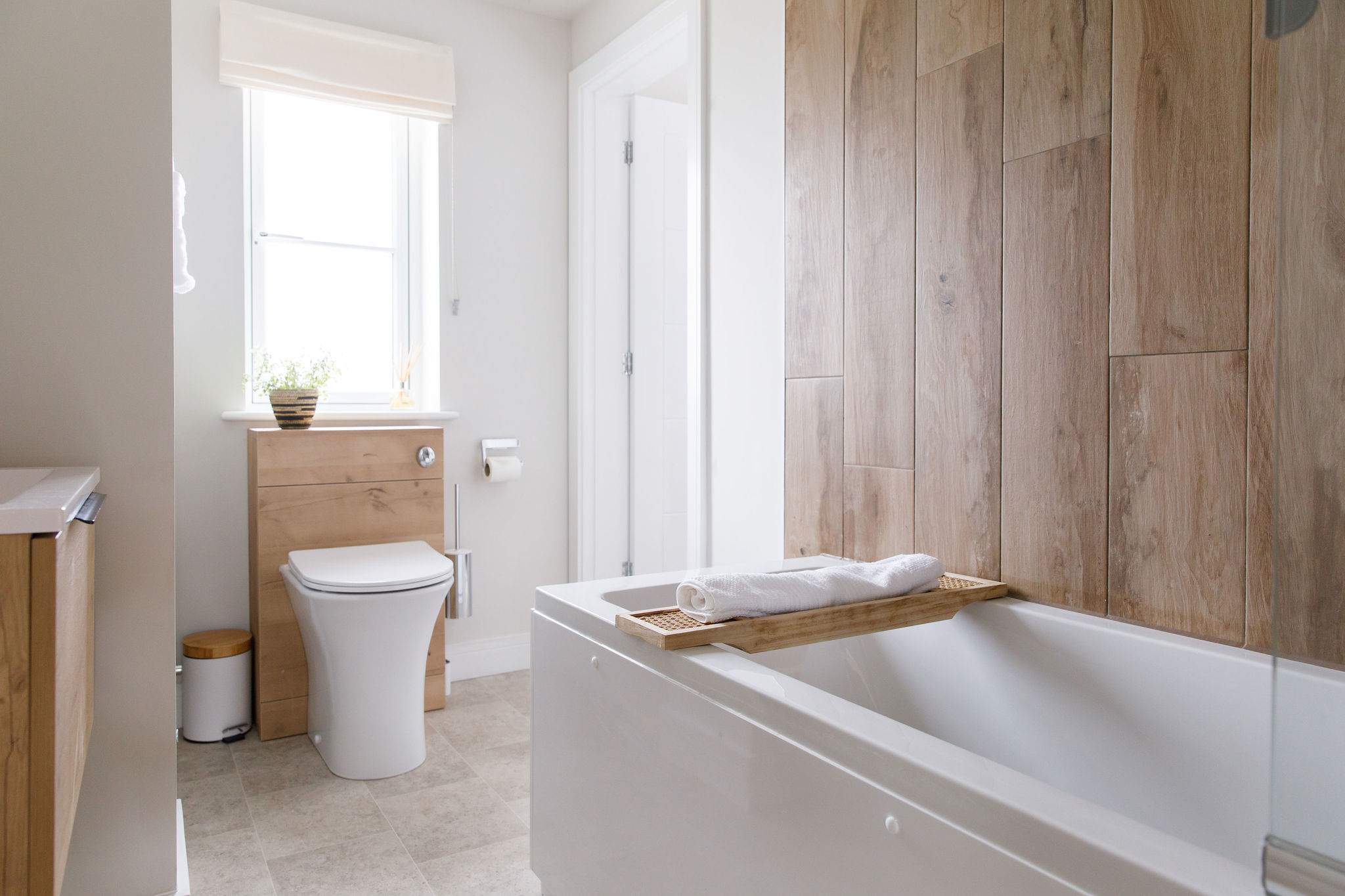 The downstairs bathroom with Jack and Jill door to the Bedroom and one to the Hallway
