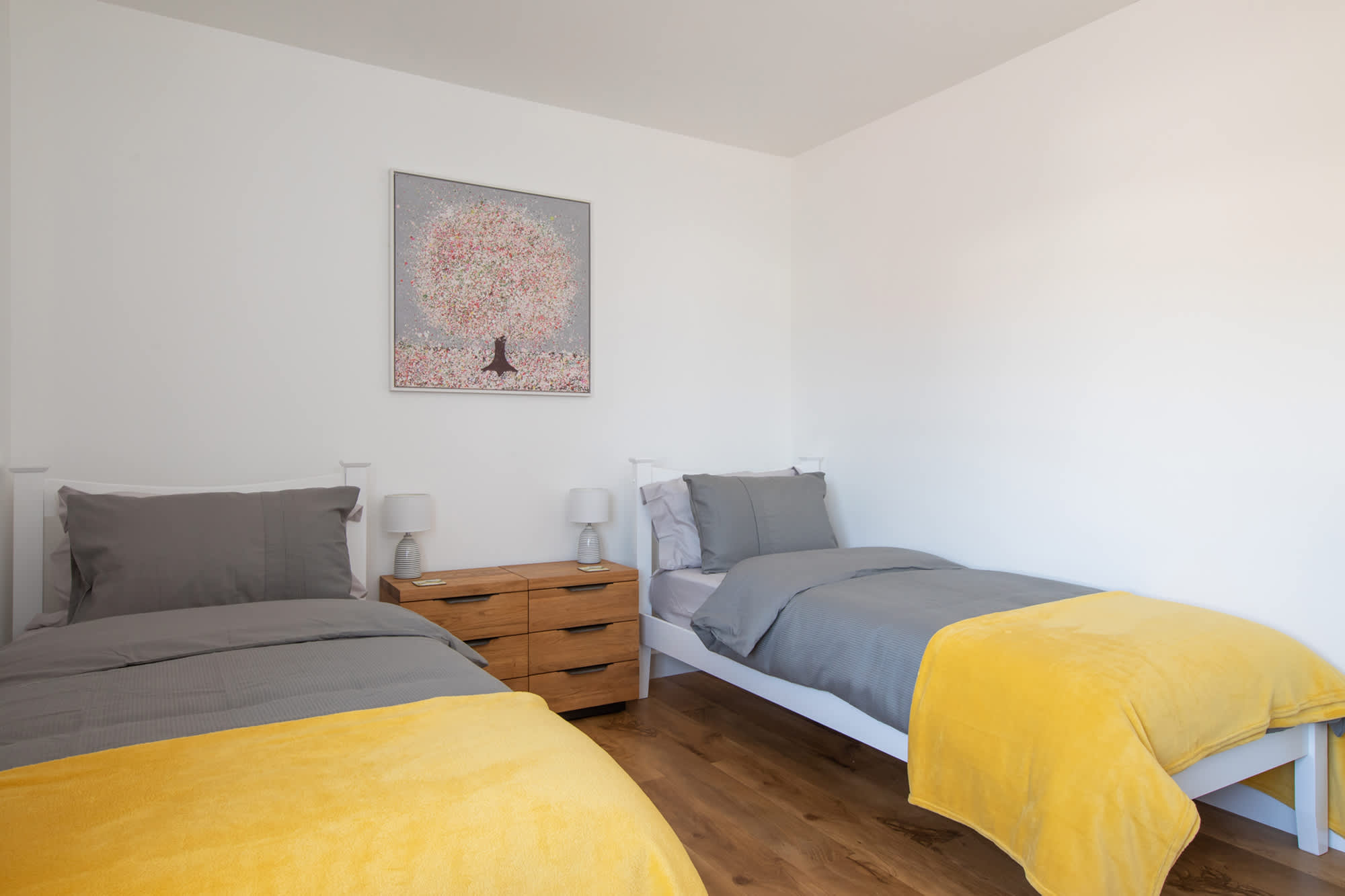 The twin bedroom features 2 super comfy single beds