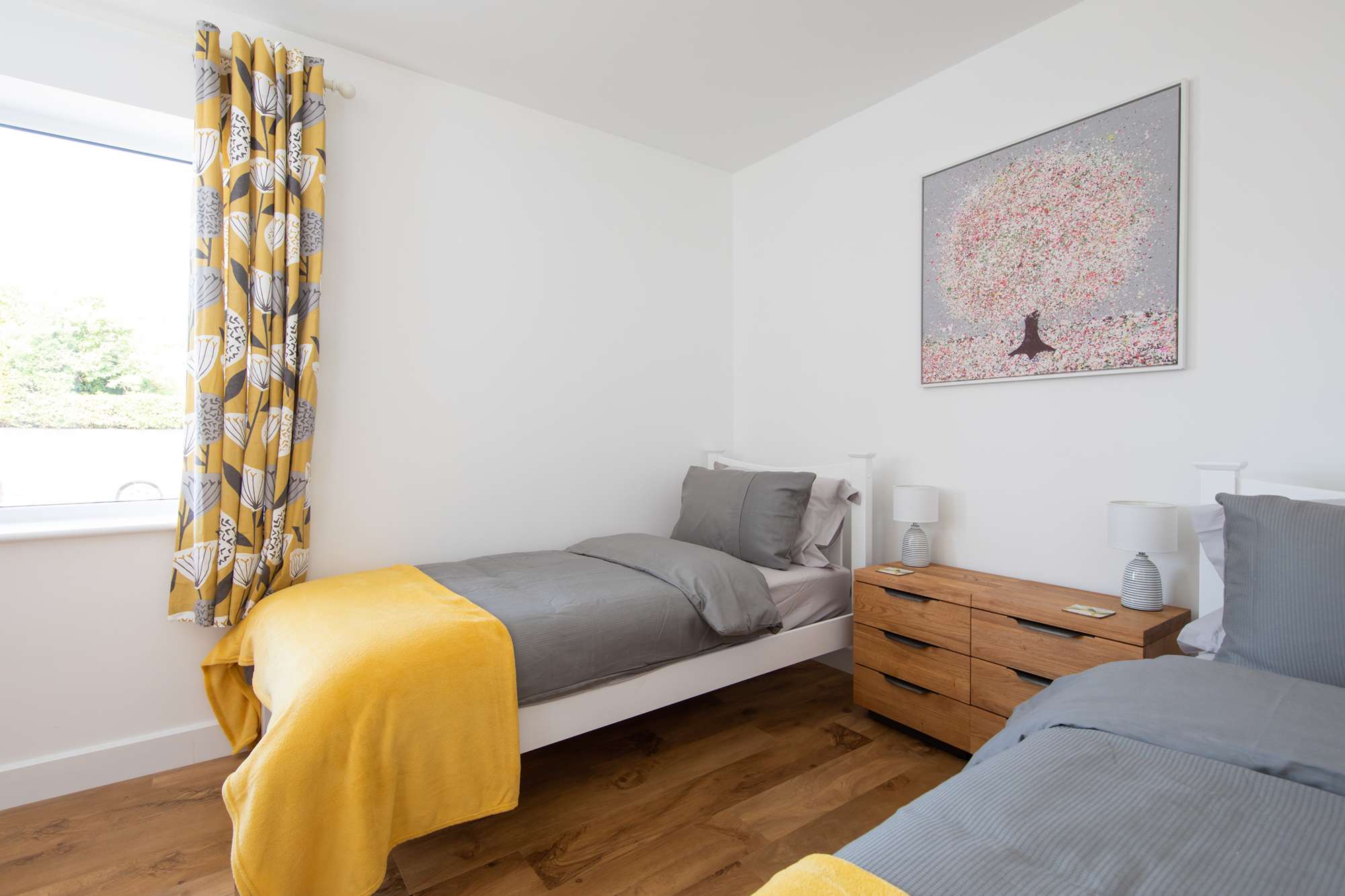 Elegant wooden floors spread out across the entire house