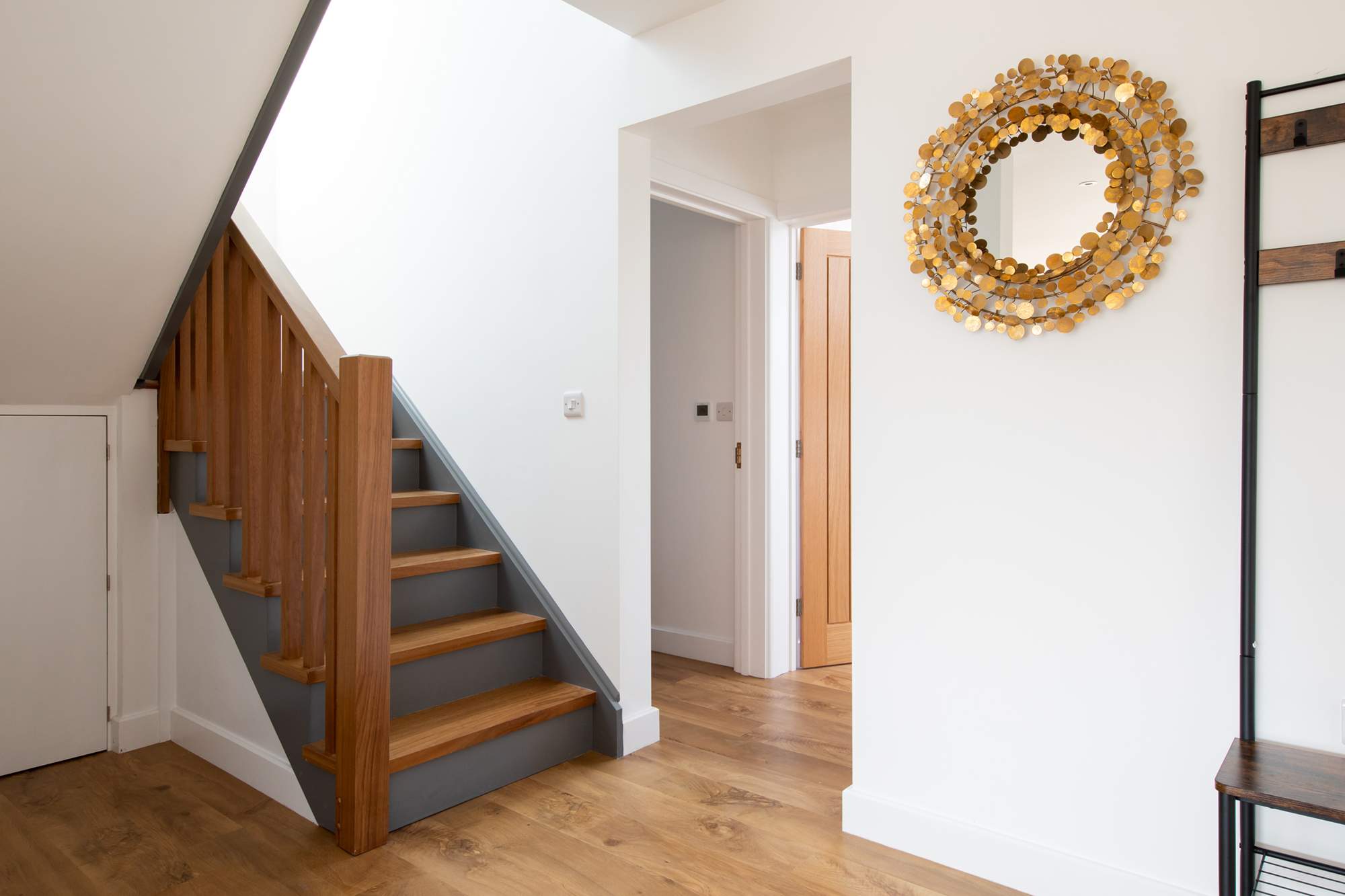 Climb up the stairs to reach the other two bedrooms