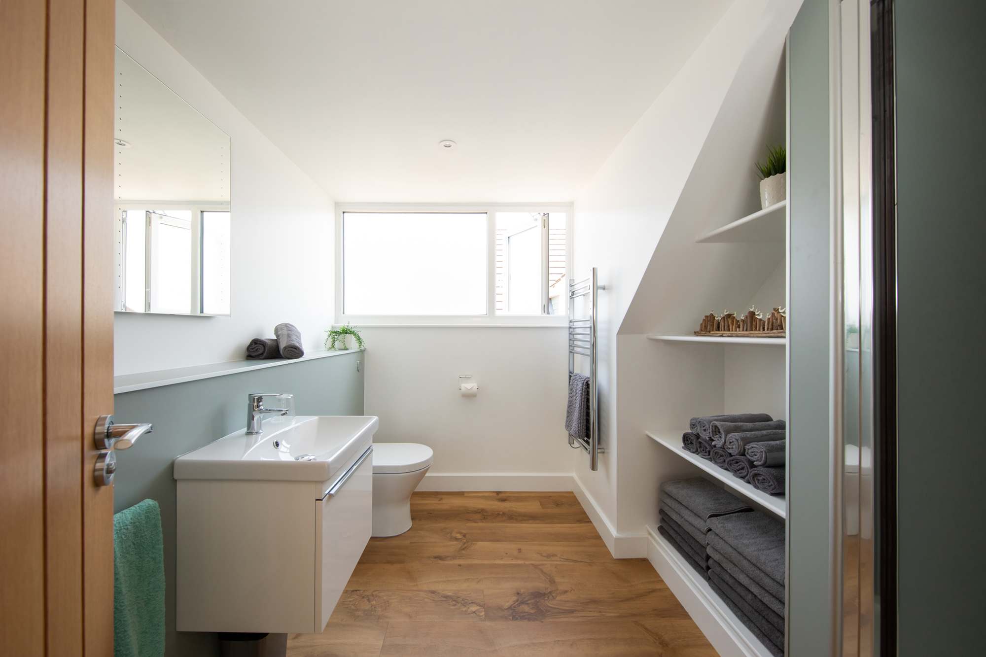 The spacious upstairs bathroom