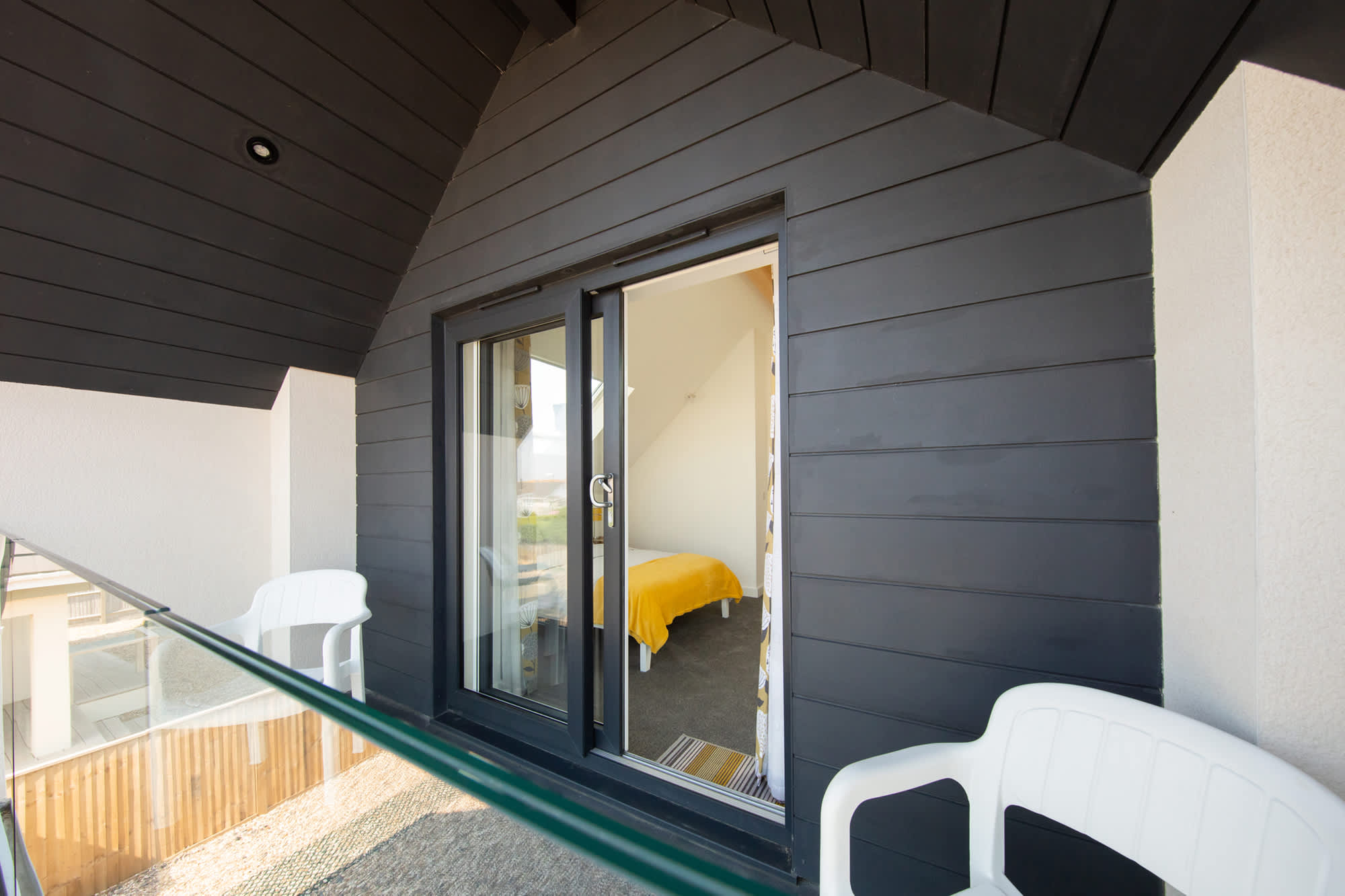 Covered balcony allows you to enjoy the outdoors even if the weather isn't sunny
