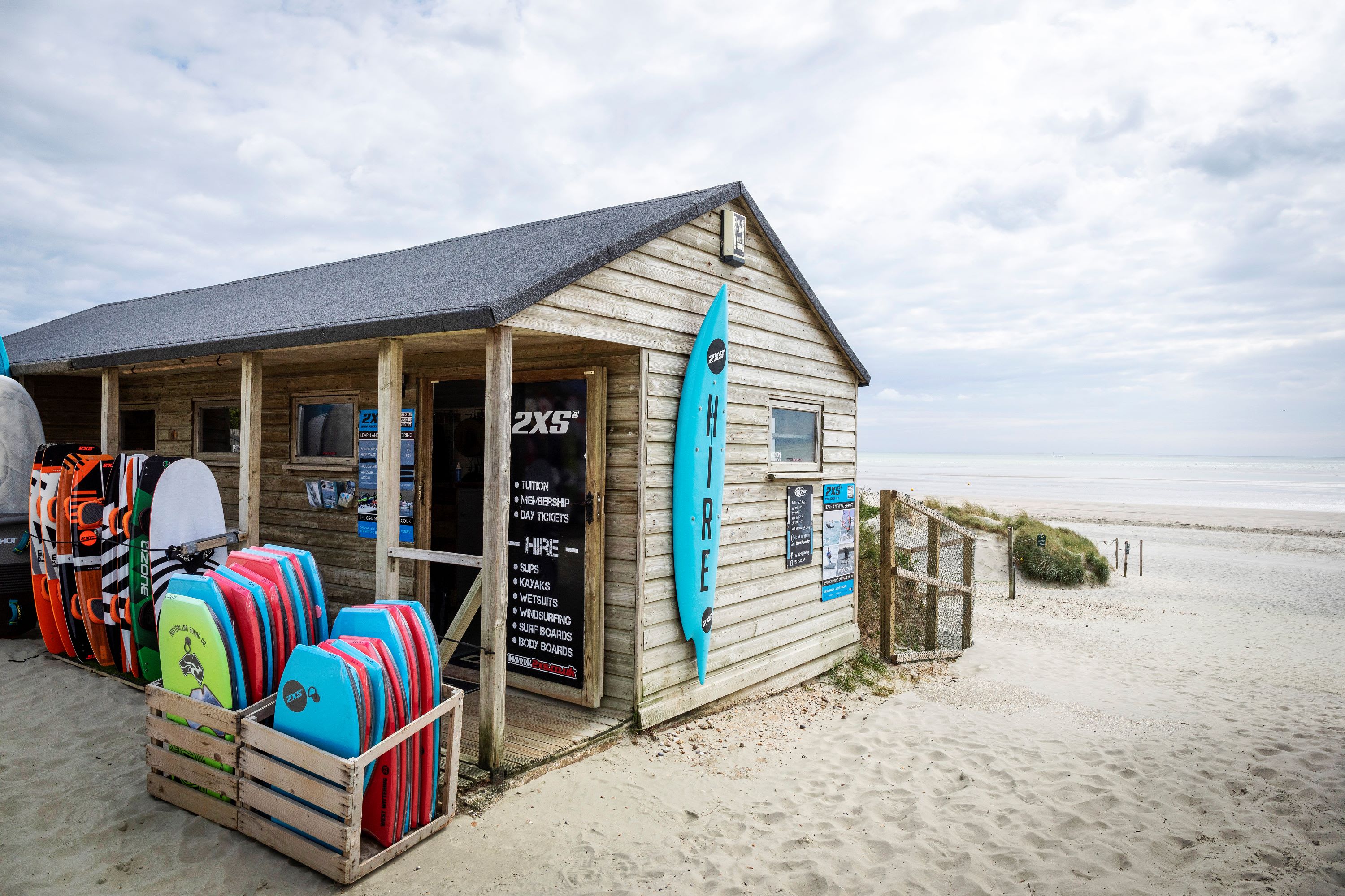 Take some windsurf lessons at 2XS on the front in West Wittering