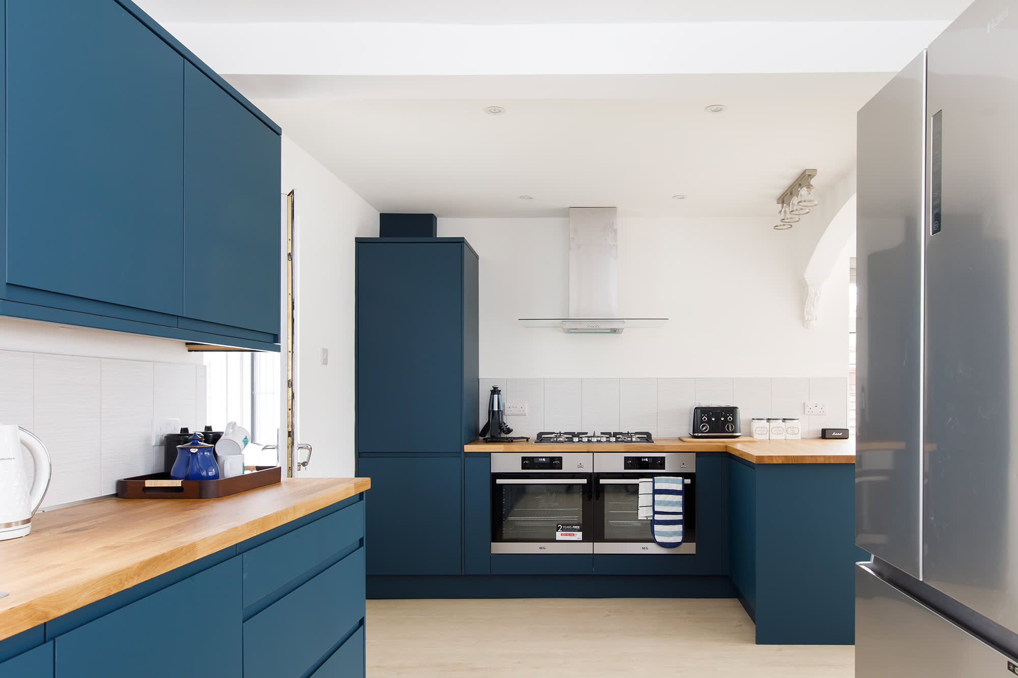 The kitchen has spacious countertops, giving plenty of room to cook up a storm or prepare beach picnics.