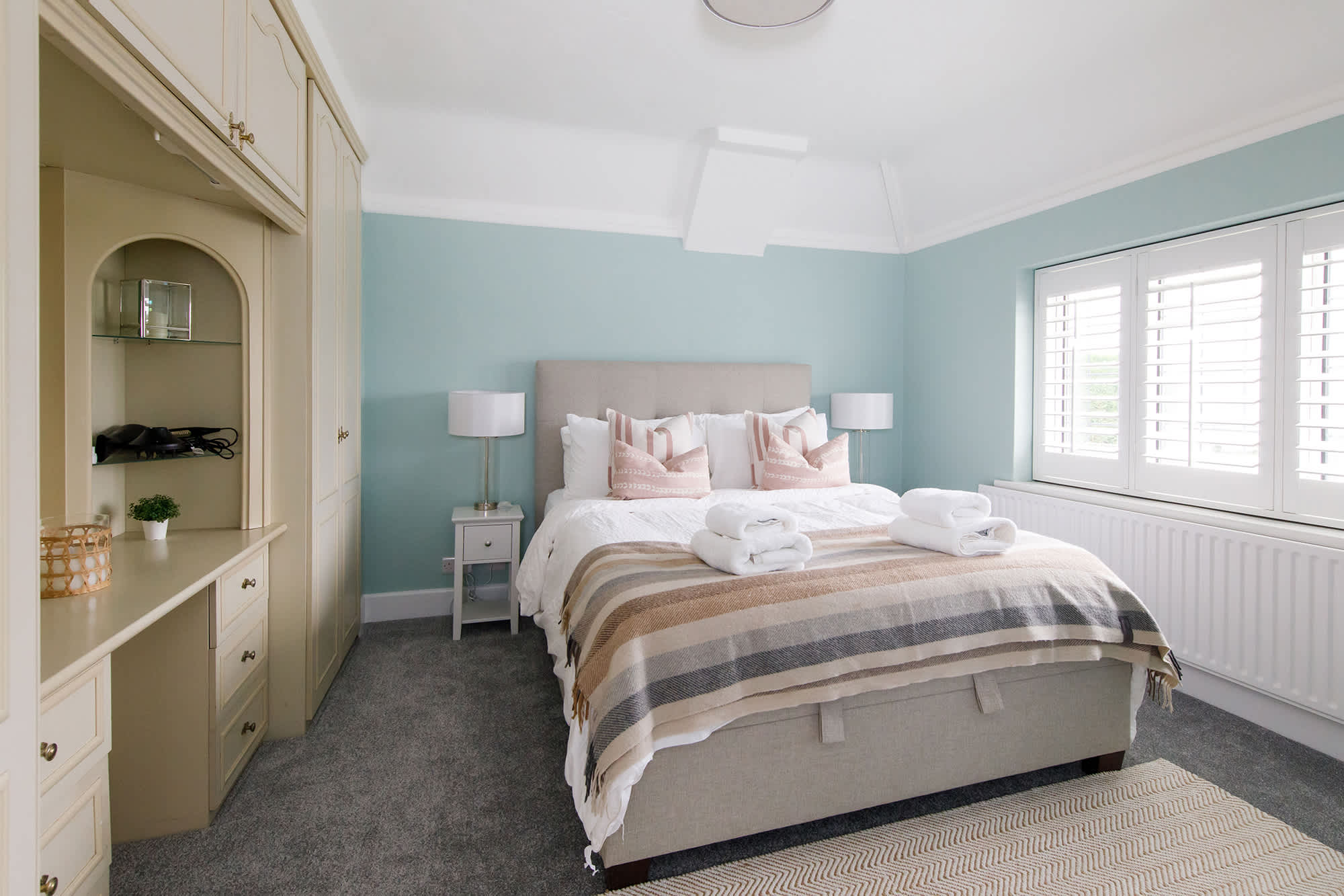 The master room has in-built wardrobes with a vanity area. Perfect for storing all your belongings and getting ready in the morning.