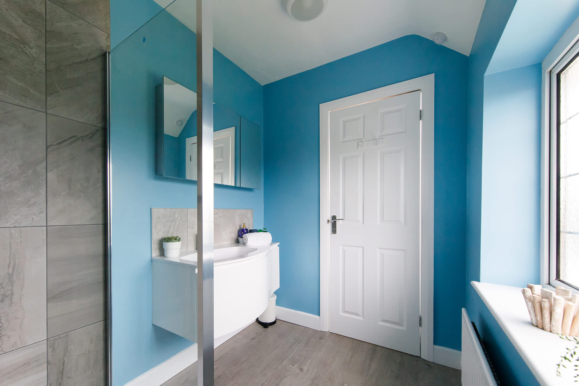 The master bedroom has a spacious ensuite with large walk-in shower.