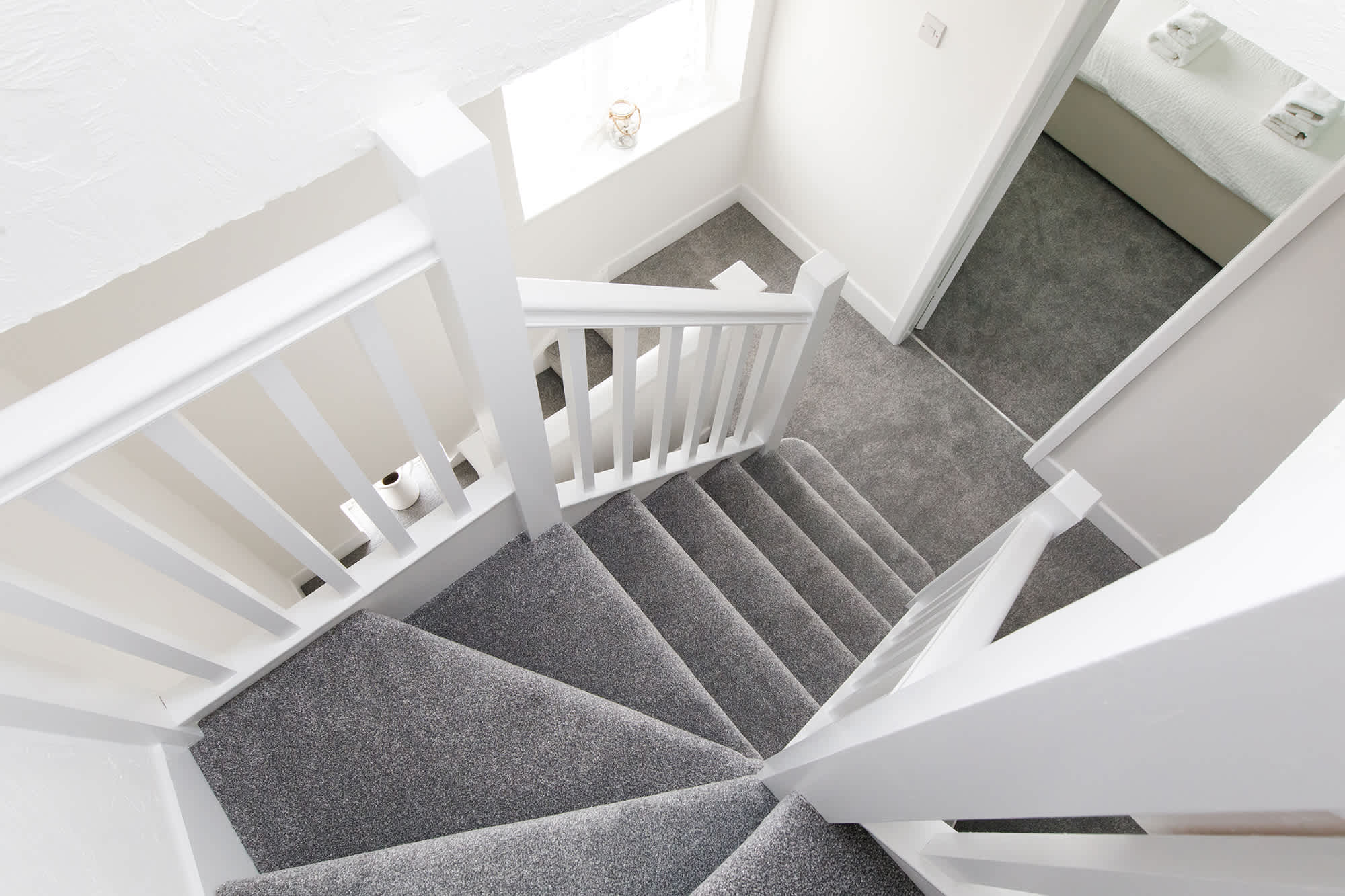 Yes, there is a second floor...! Head up to the loft room to find a fourth bedroom and office.