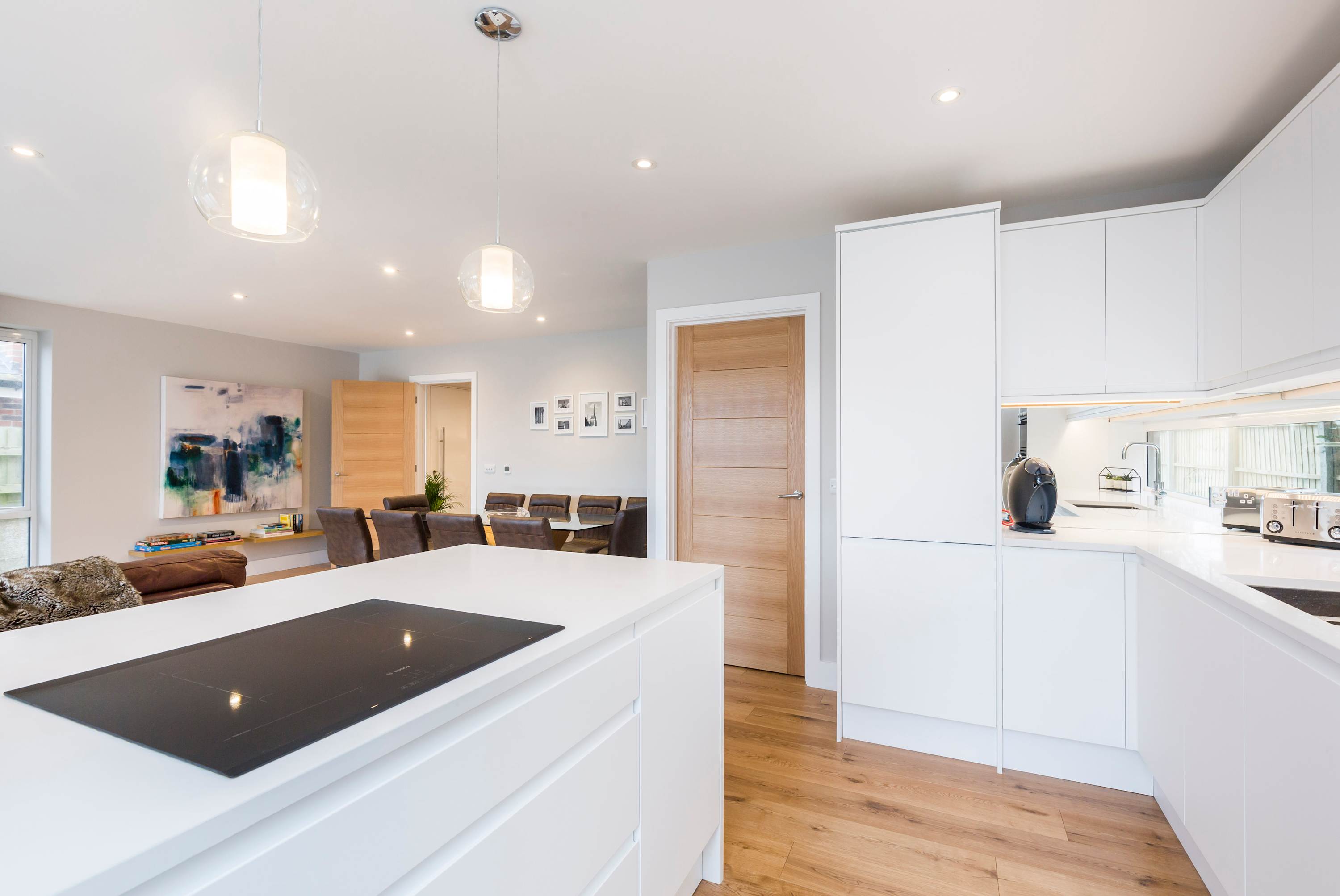 A view from the kitchen to the dining area