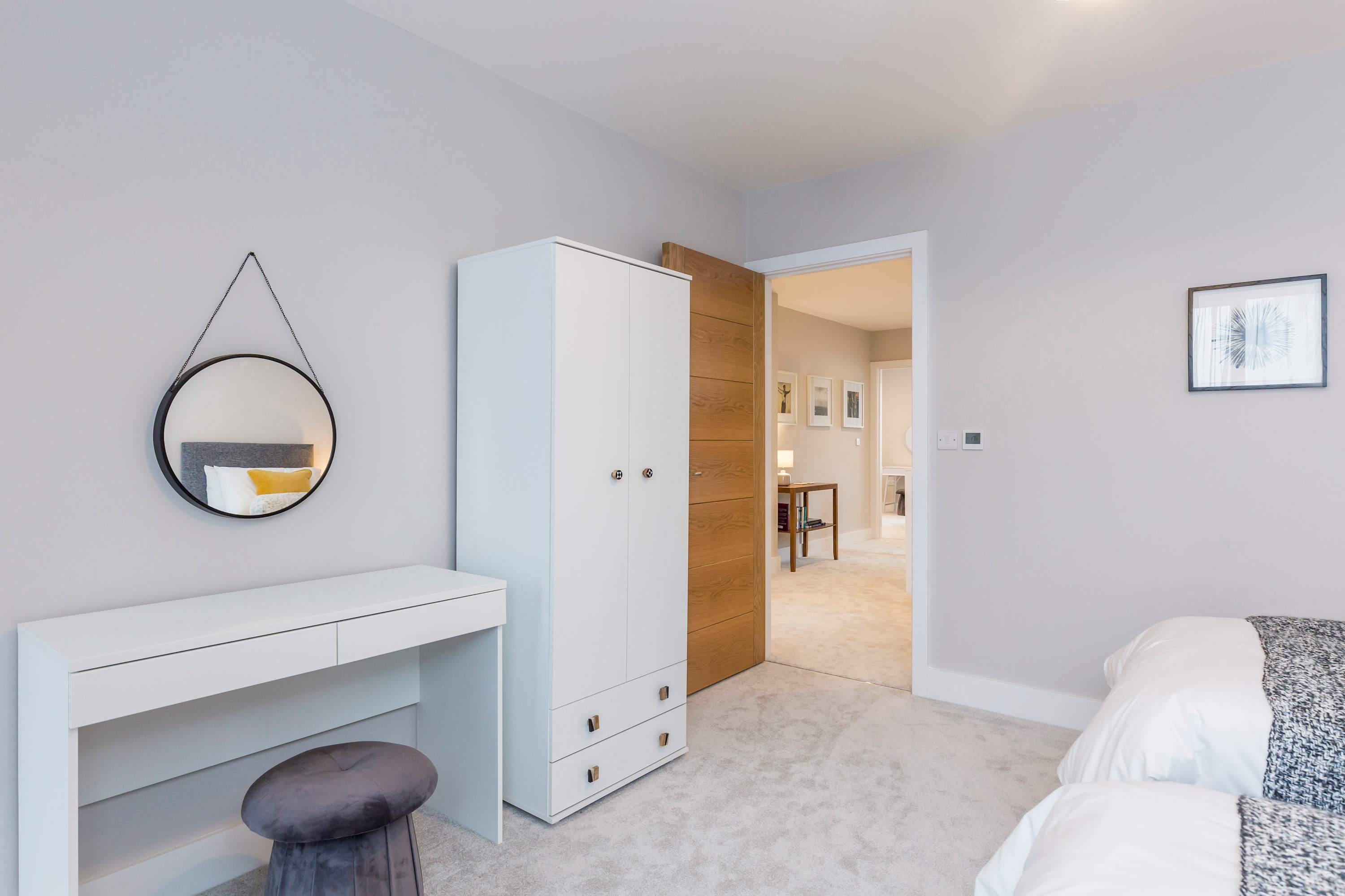 Storage and a make up table in the twin room