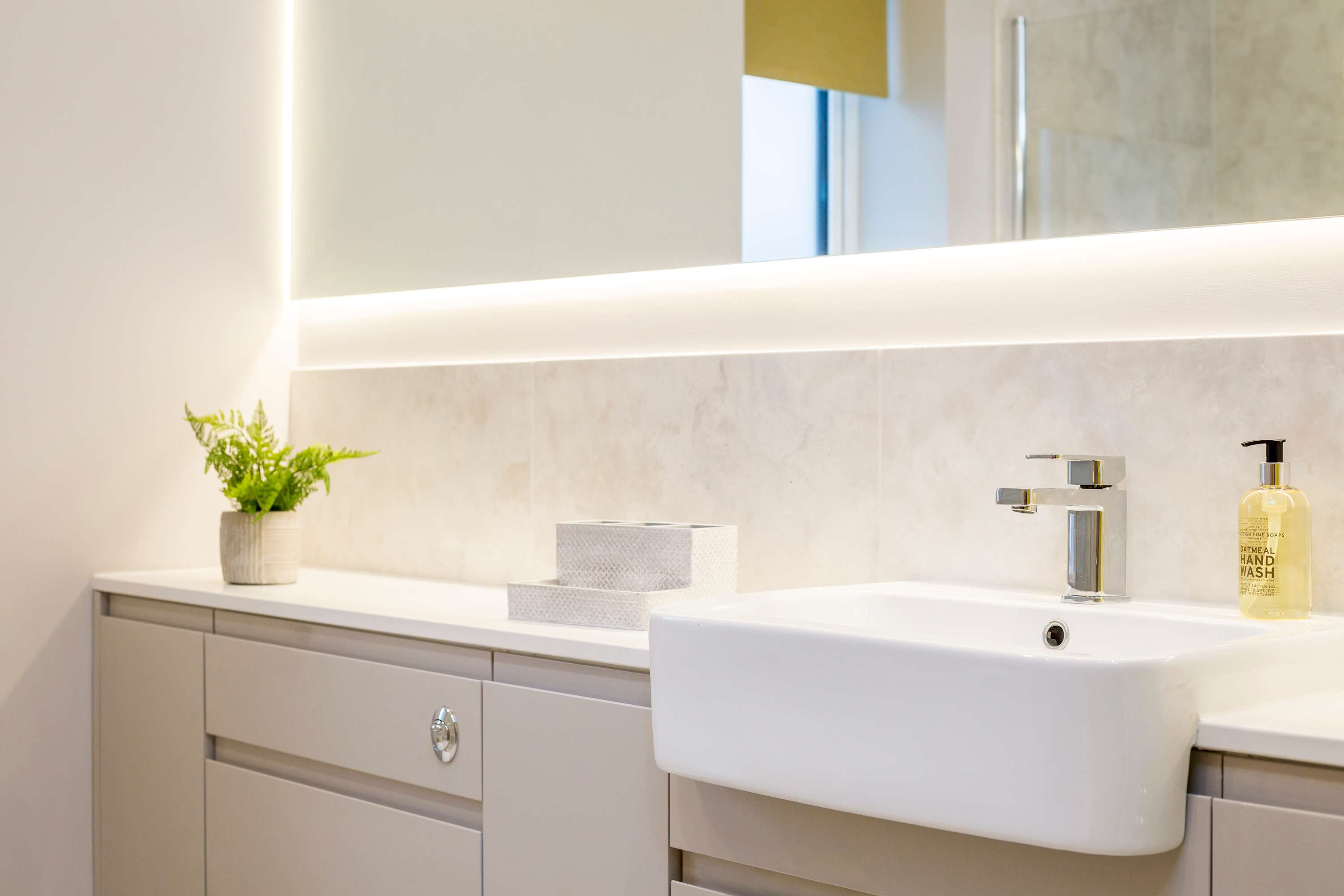 There's no let-up in the style in the bathrooms of this beautiful house.