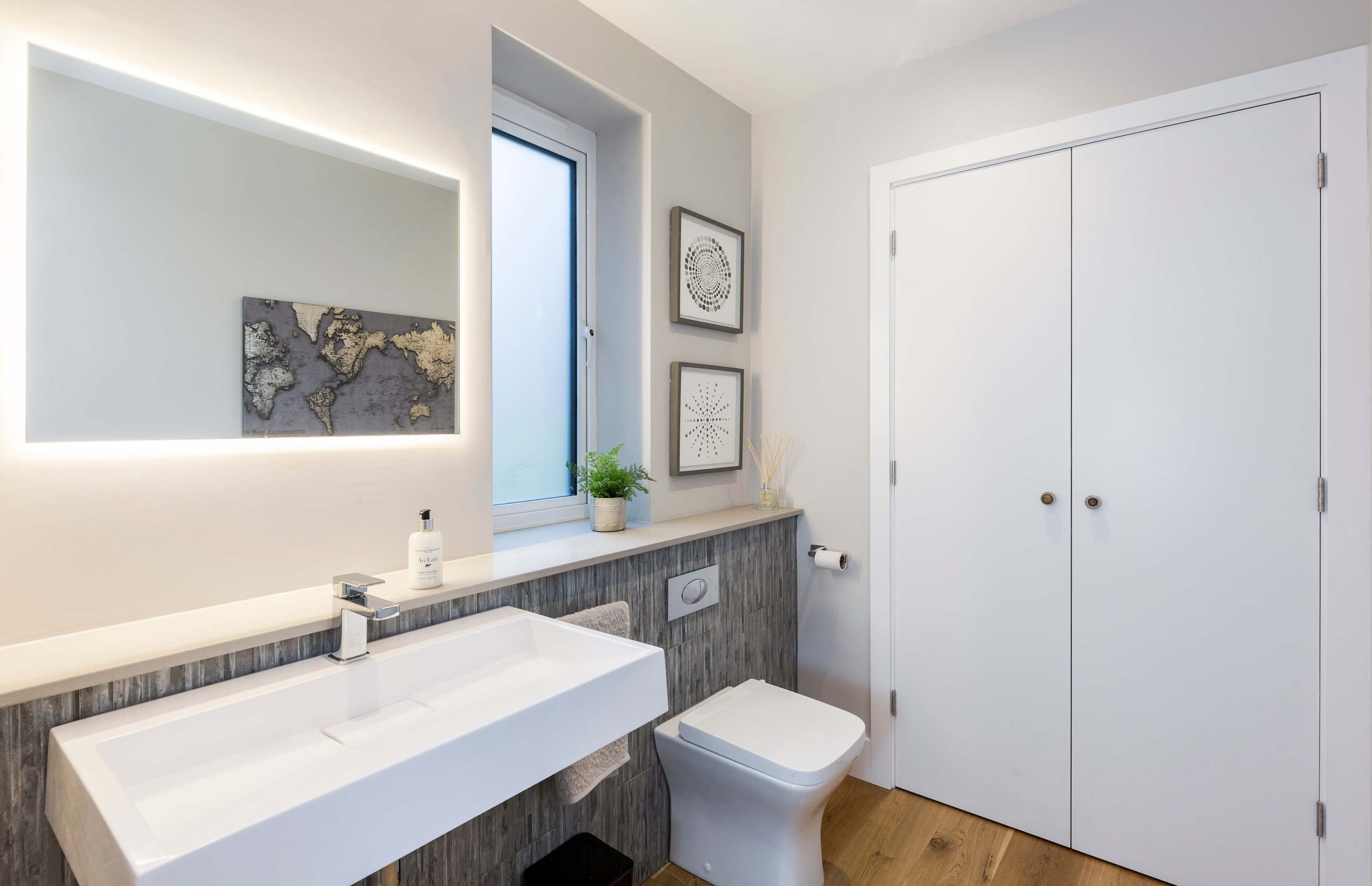 Get ready to go out in one of three stylish bathrooms.