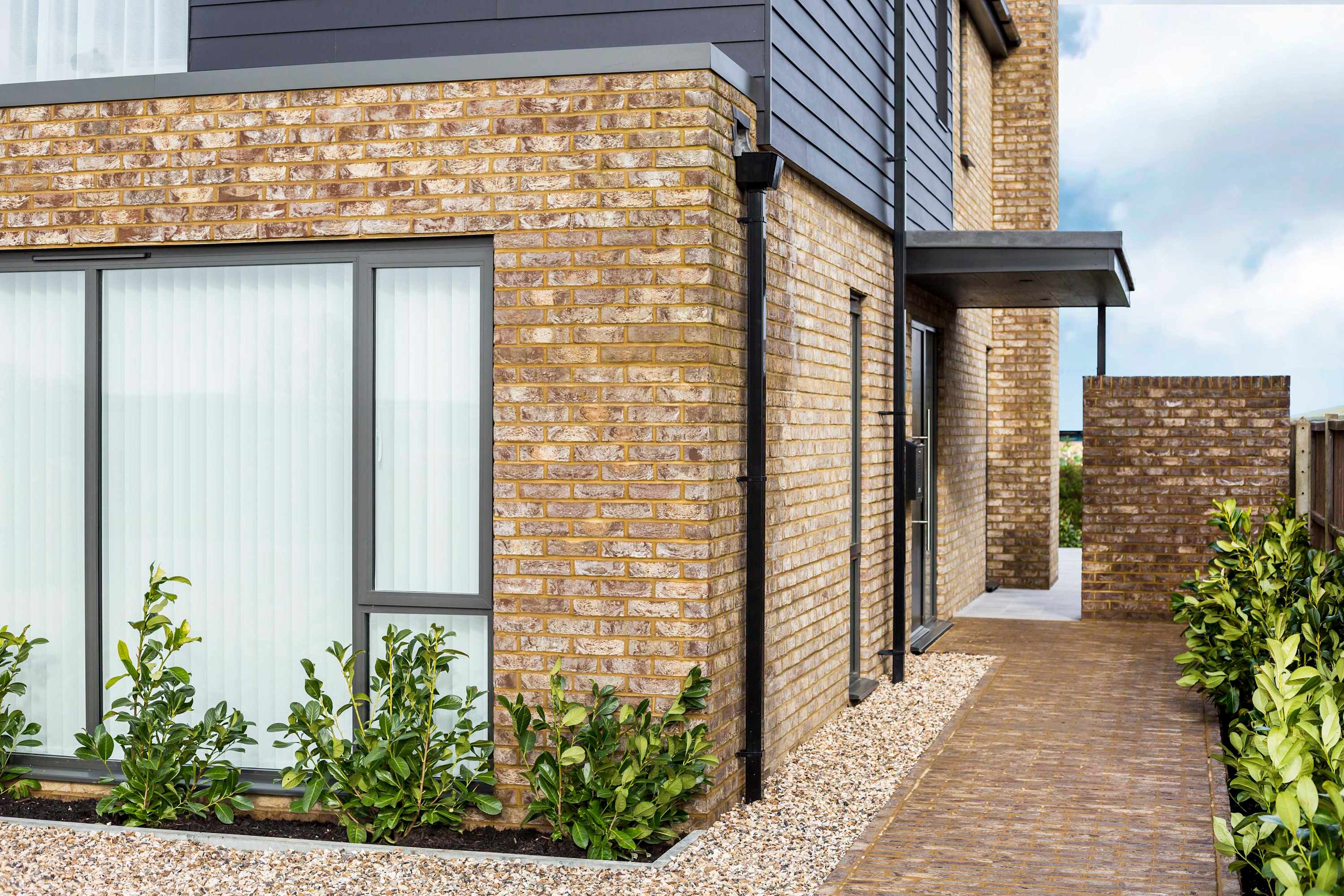 The front door and arch to the rear garden