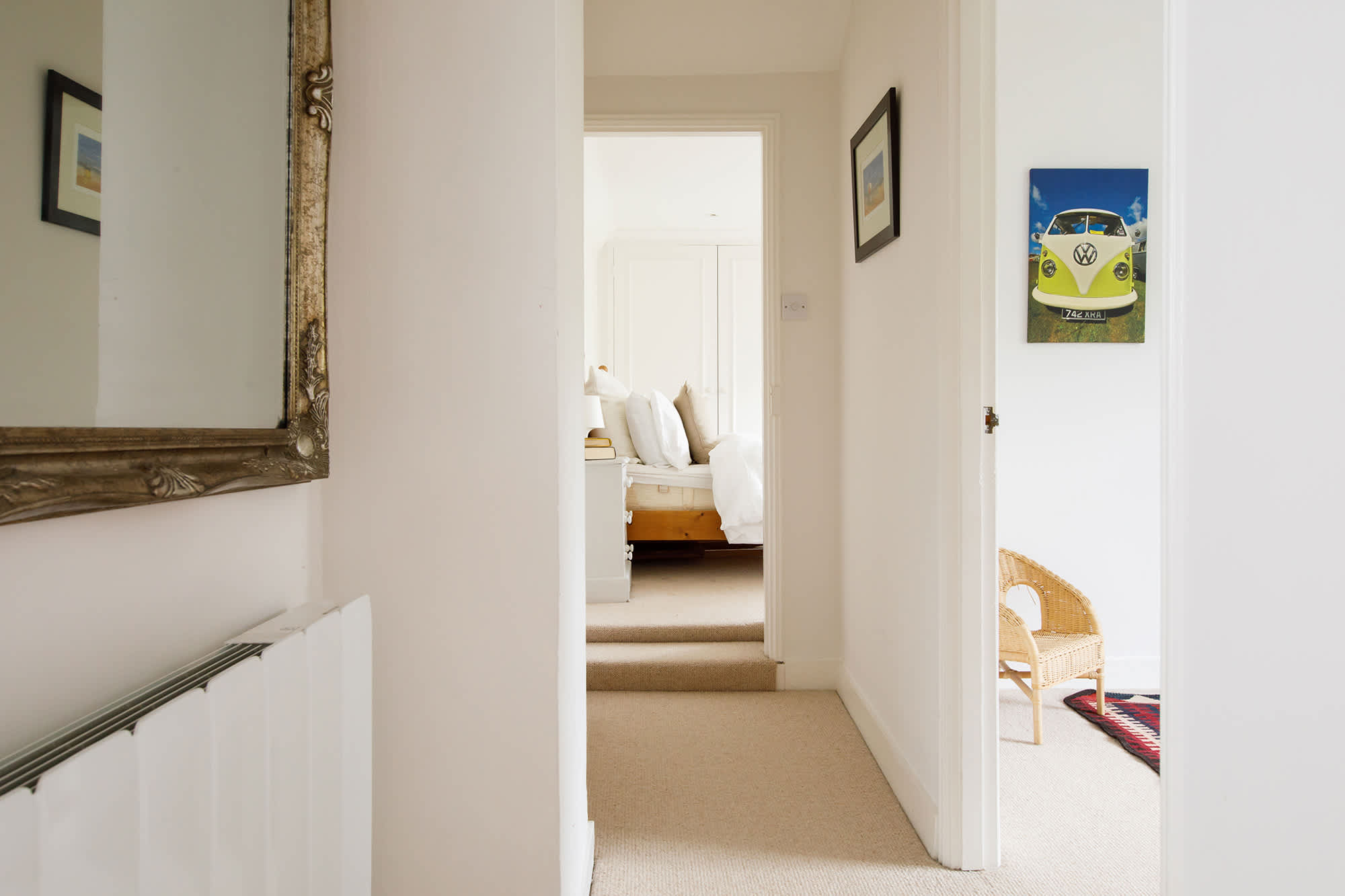 Snug carpeted floors cover the entire top floor