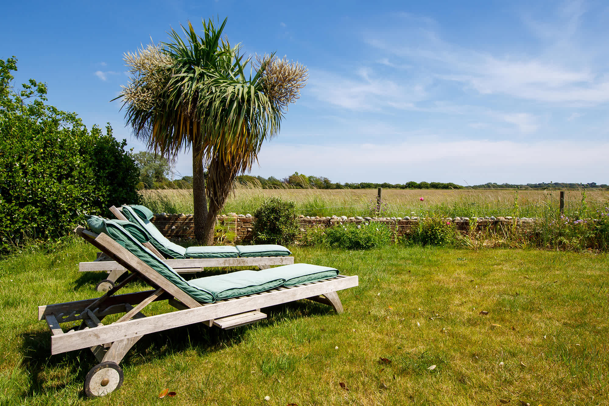 Lounge in the peaceful garden, soaking up the sun