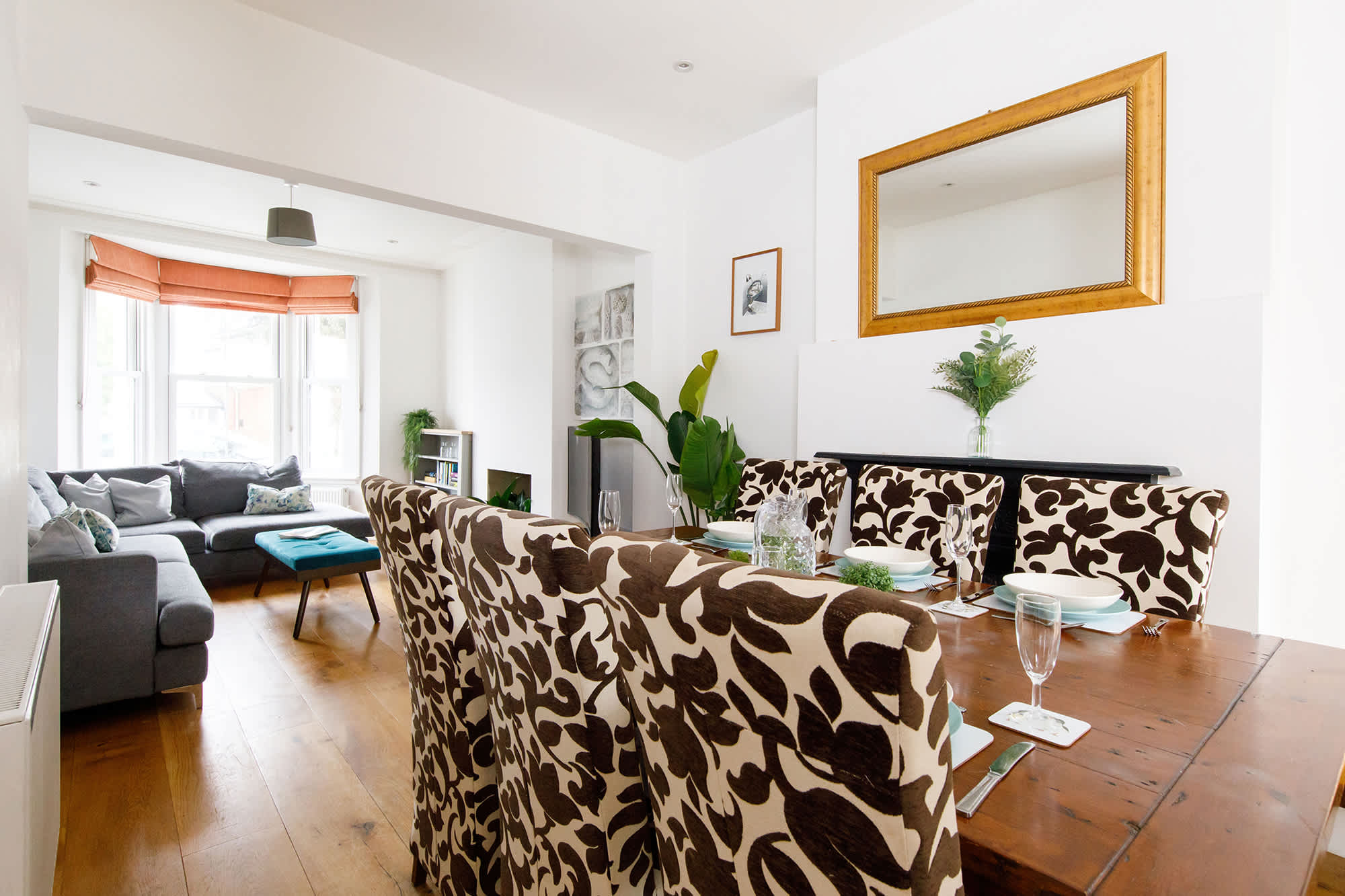 A beautiful dining area sits just off the cozy lounge area.