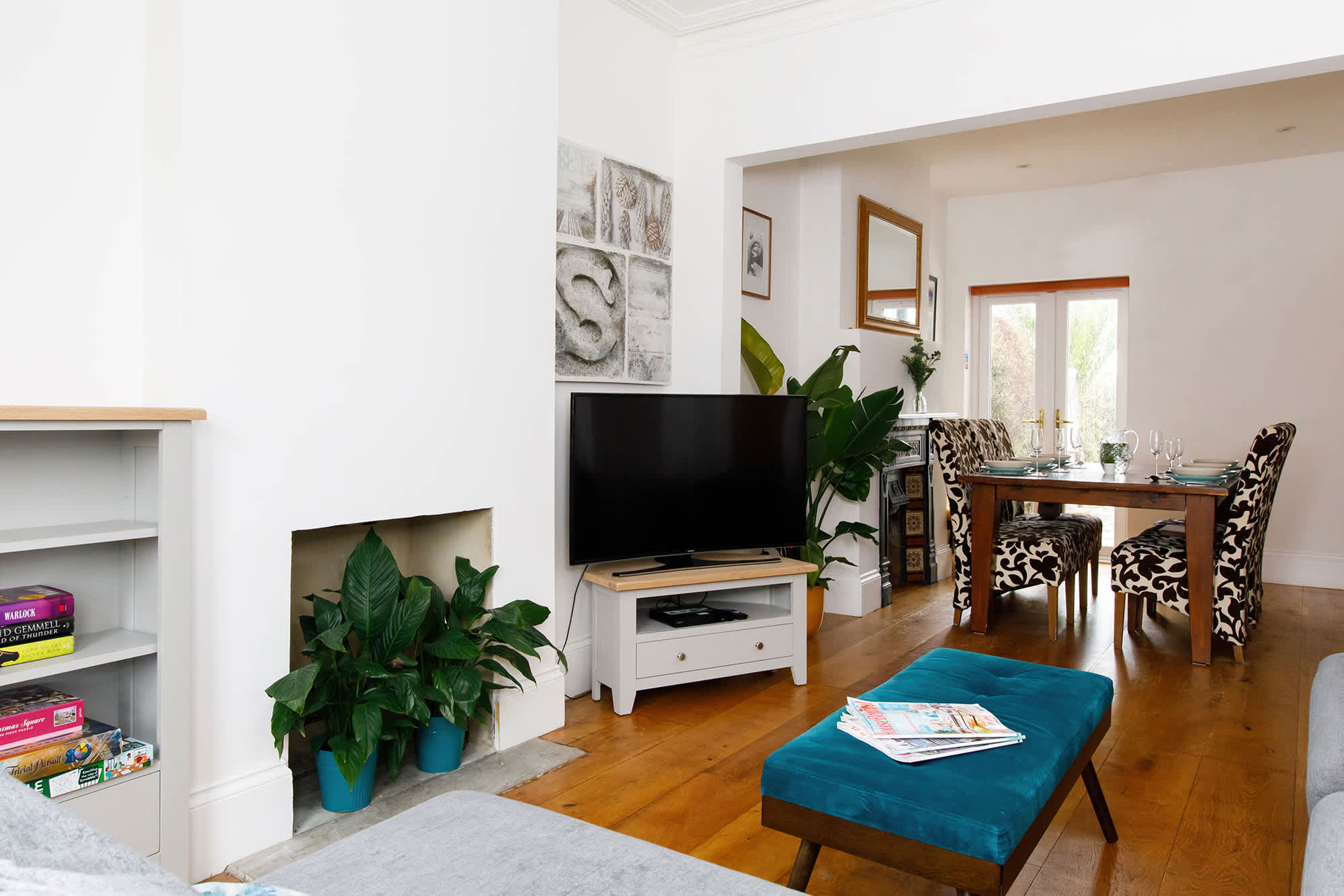 The lounge and dining area combine to make one large entertaining area that is ideal for gathering.