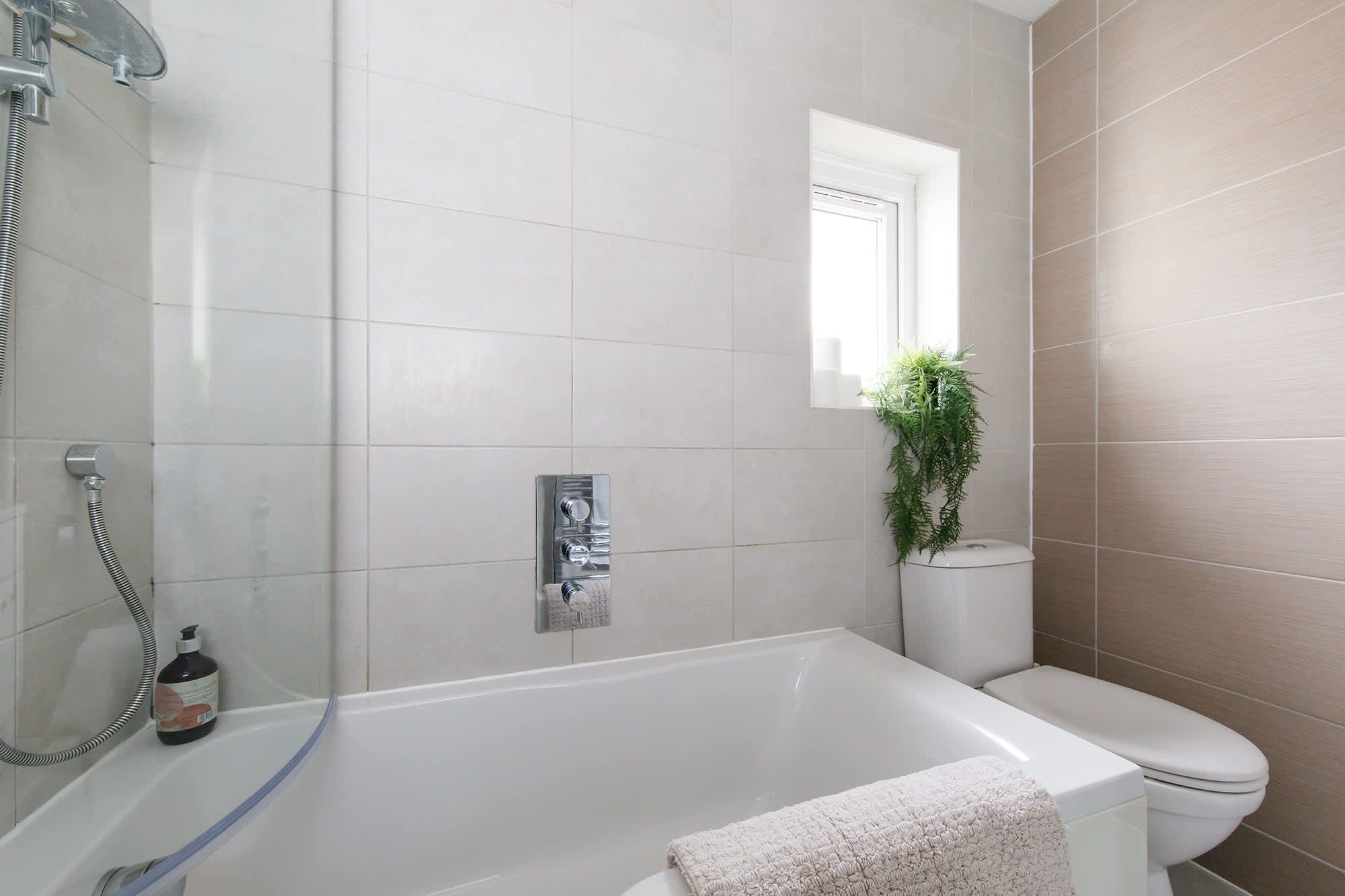 Take a long soak in the bath after a fun filled day spent by the seaside.