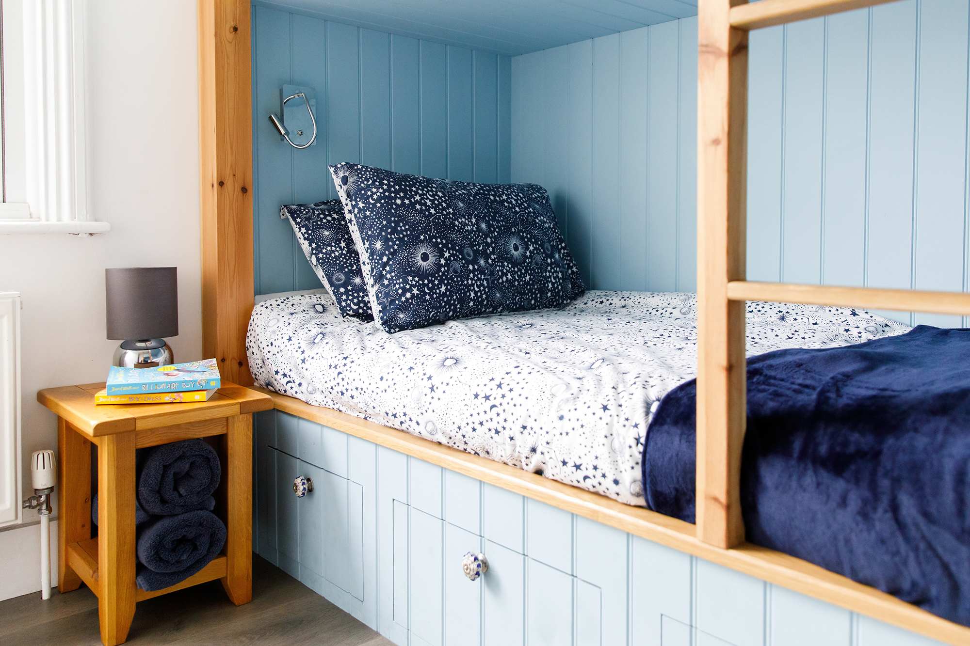 Comfy cushions and bed throws are found in all bedrooms.