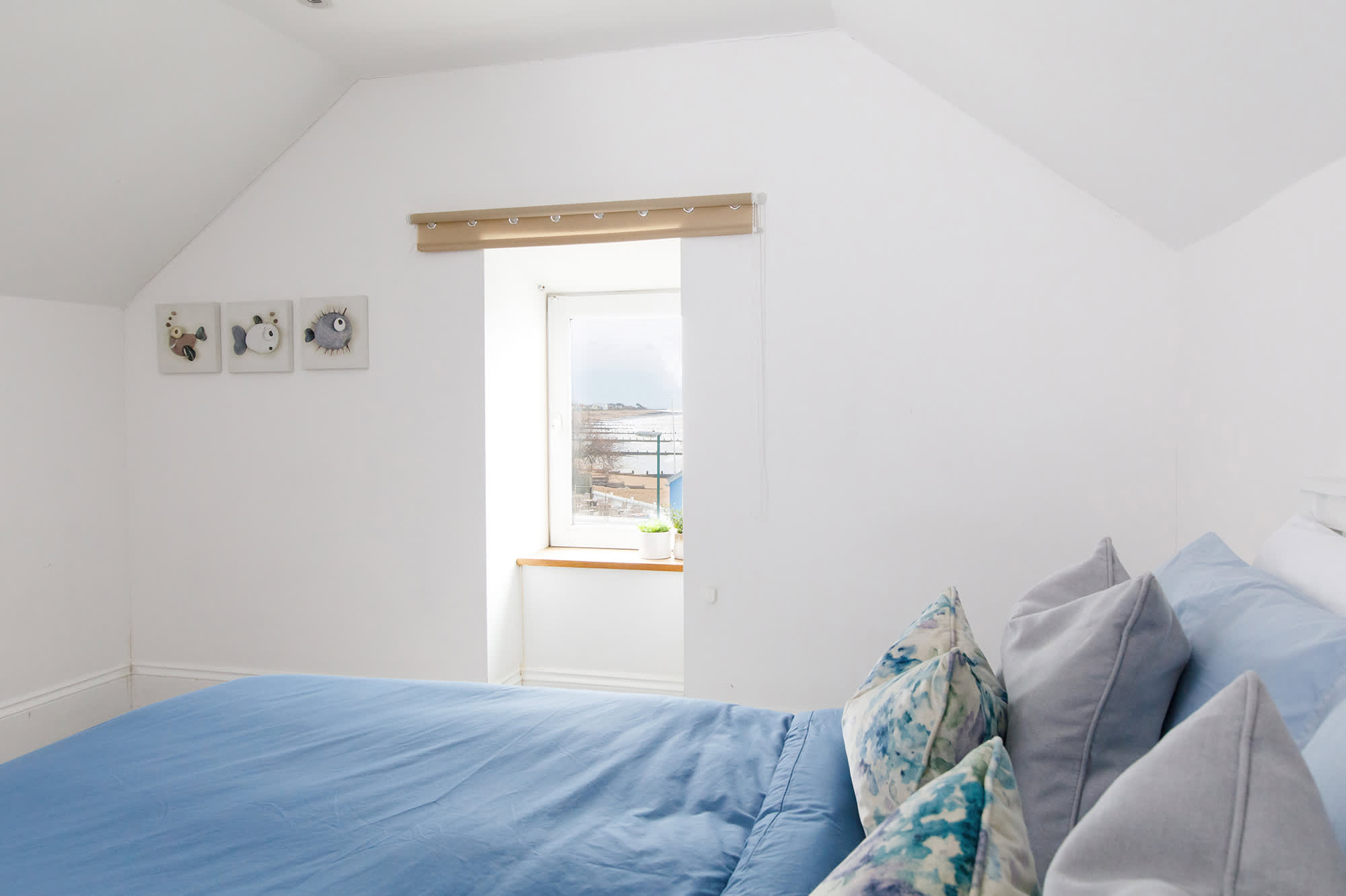 A king size bed and picturesque views.