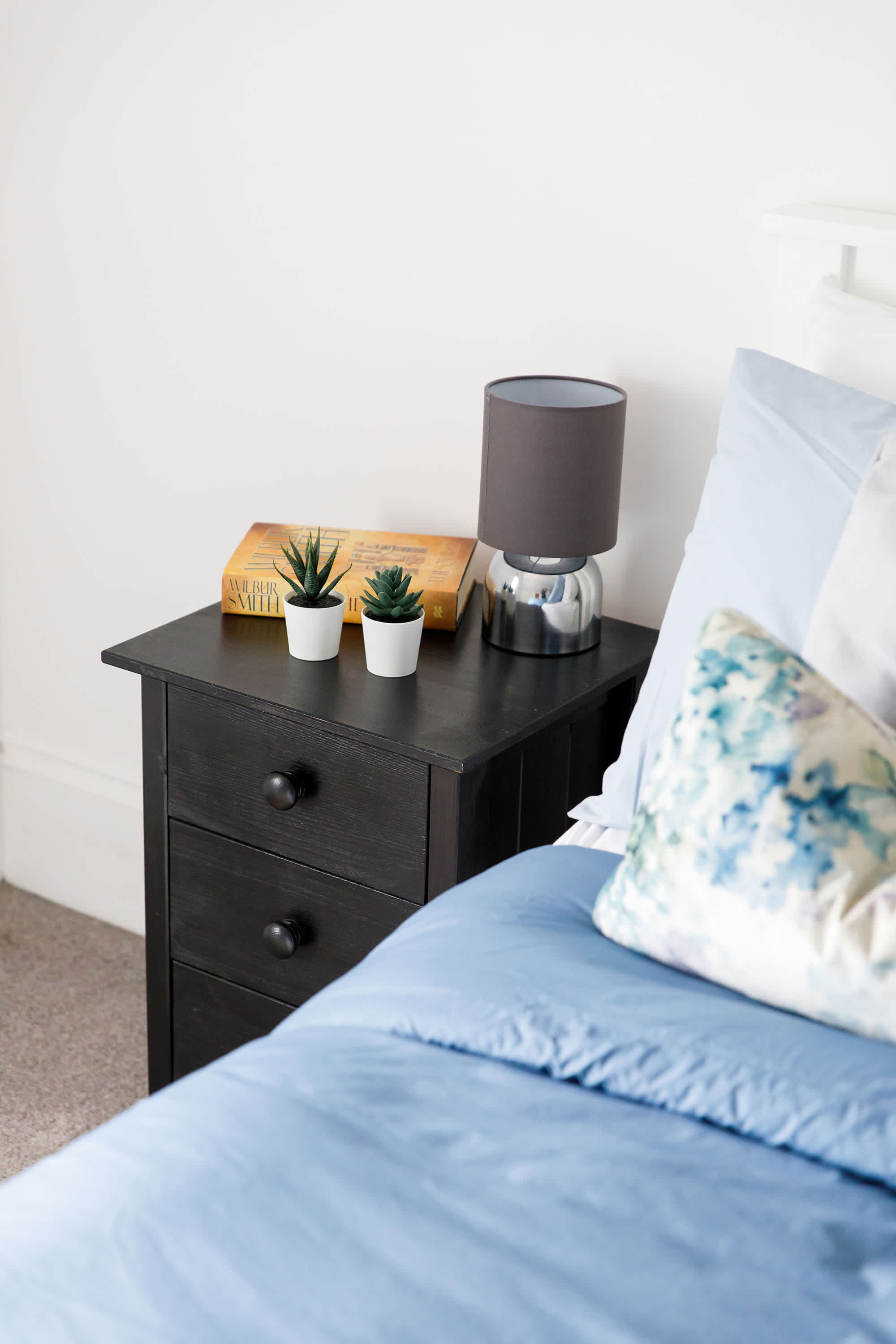 Tucked under the eaves on the second floor is the fourth bedroom.