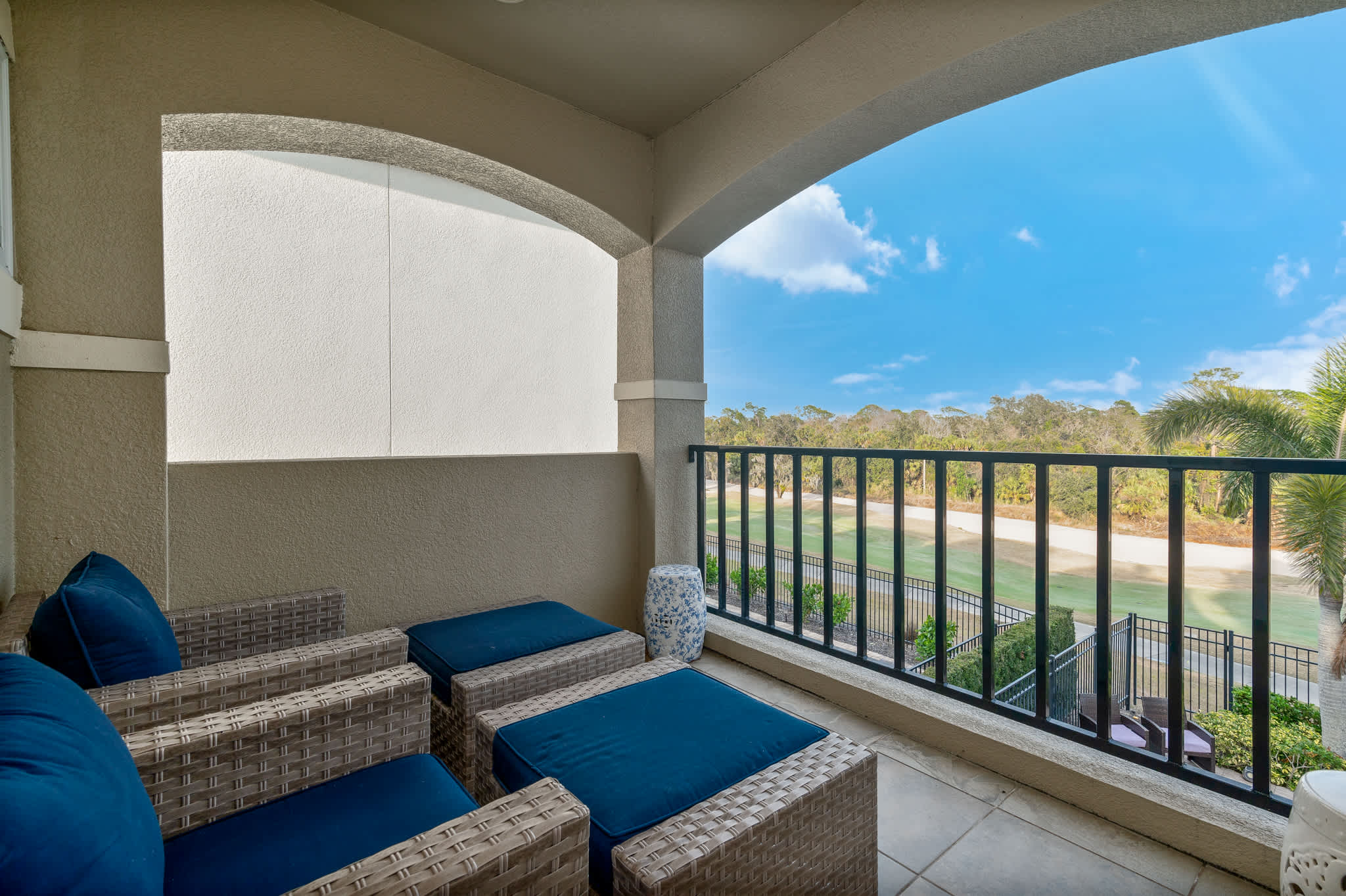 Balcony attached to Bedroom 2 overlooking the pool and golf course!