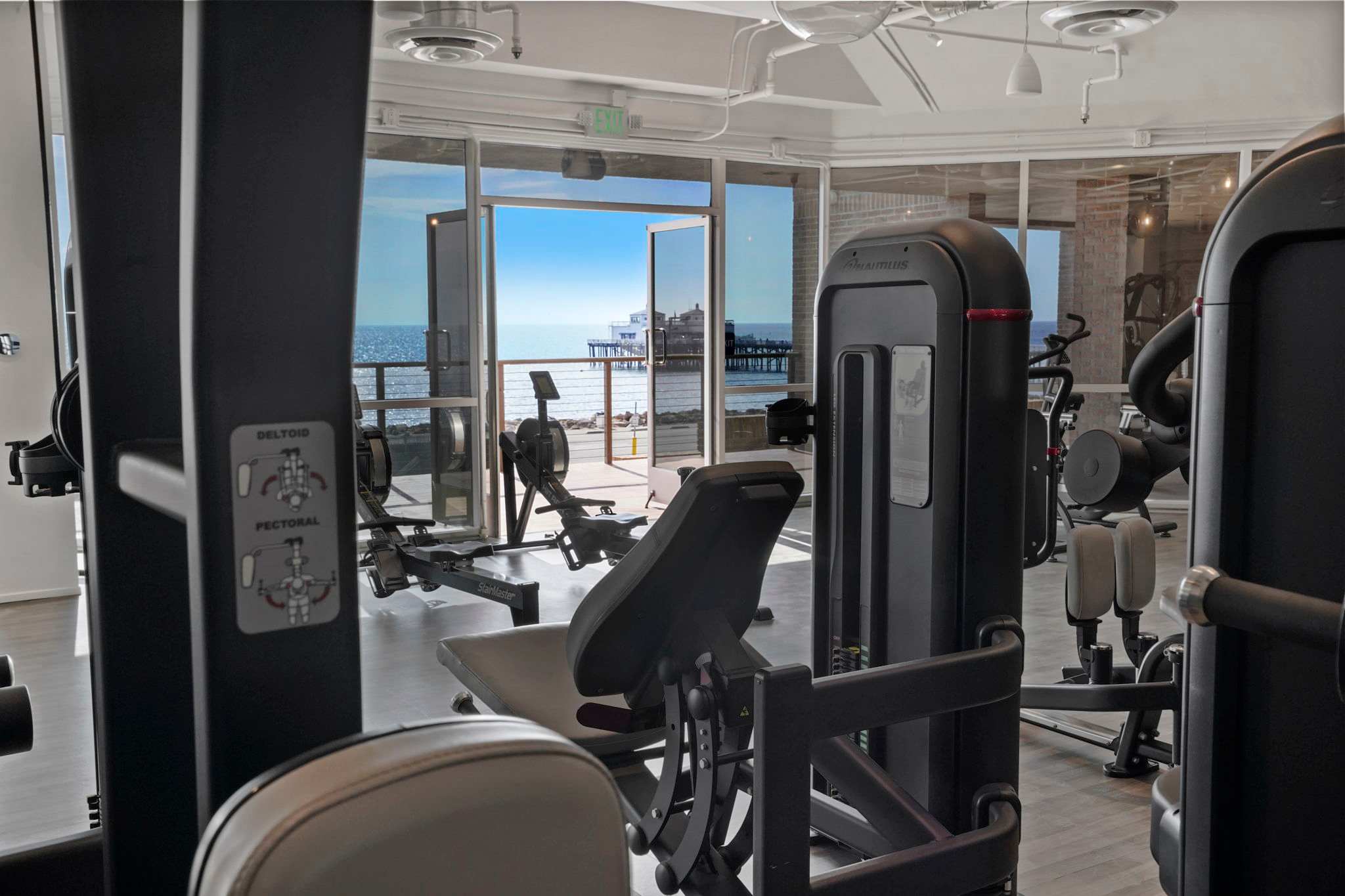 Maintain your routine at CURE Spa, a premier wellness club nearby, where cutting-edge fitness meets breathtaking ocean views.