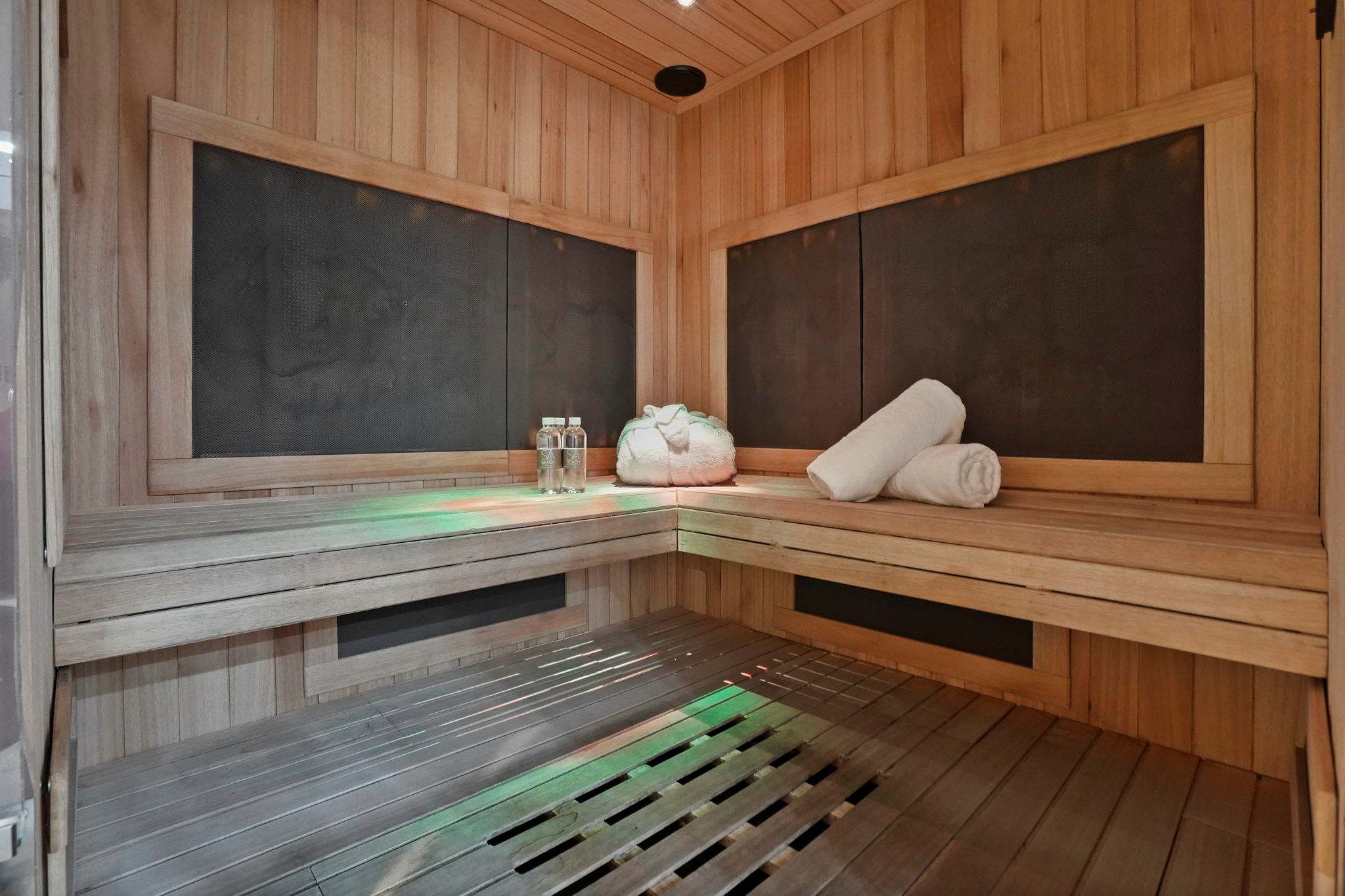 Step into the warmth of CURE Spa's private sauna—an elevated wellness experience nearby.