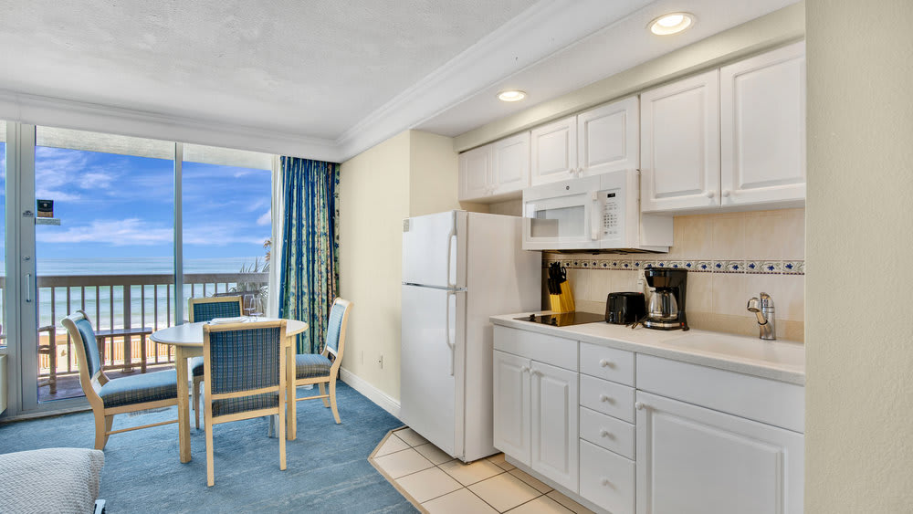 Waterfront studio w/ balcony steps from the shore