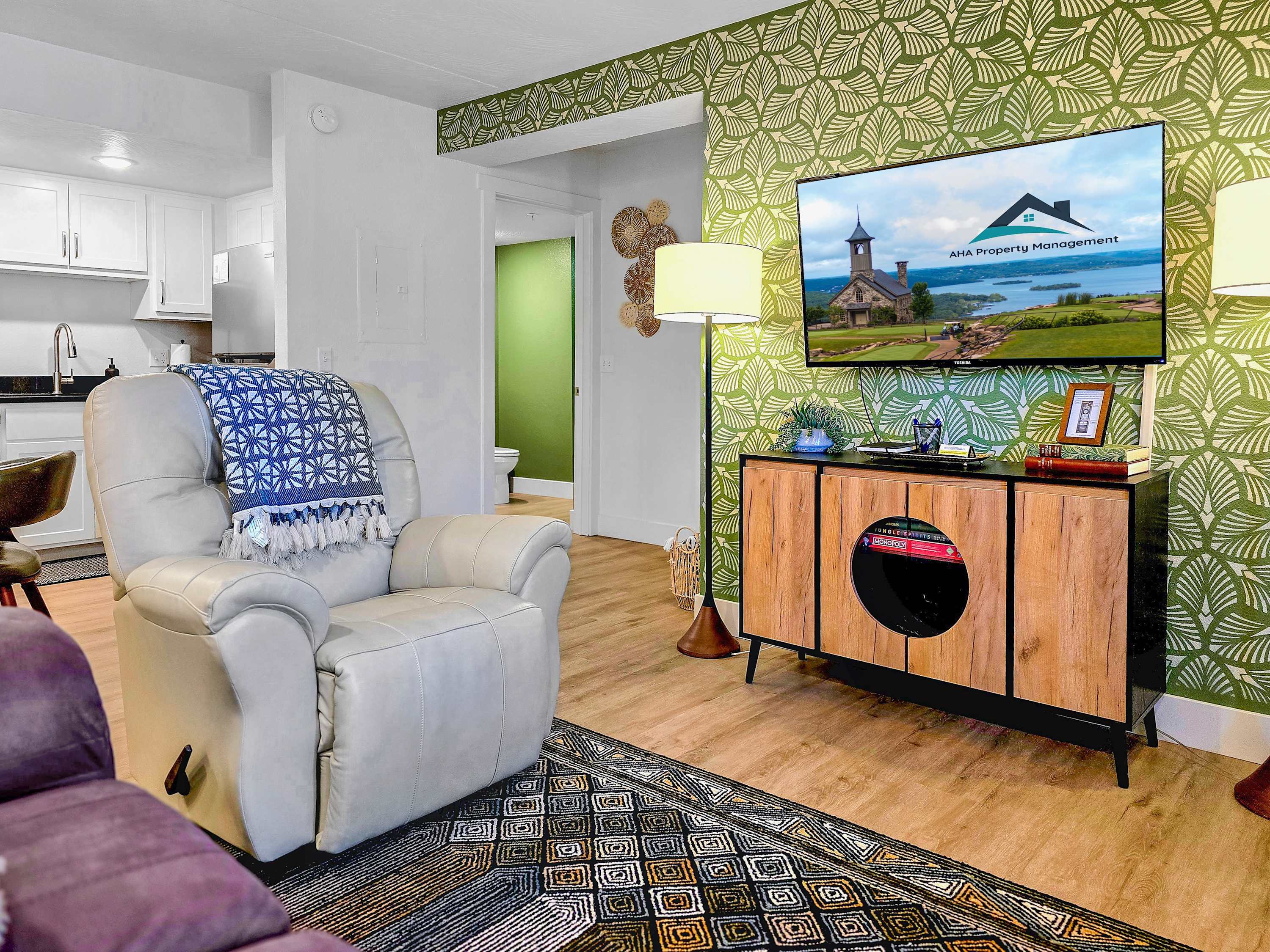 Comfy, beautiful living room with stylish, fun decor. Sit back in your sweet recliner and just enjoy the day.
