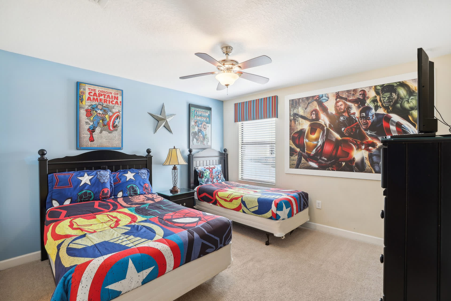 Captain America Themed bedroom with full and single bed and TV