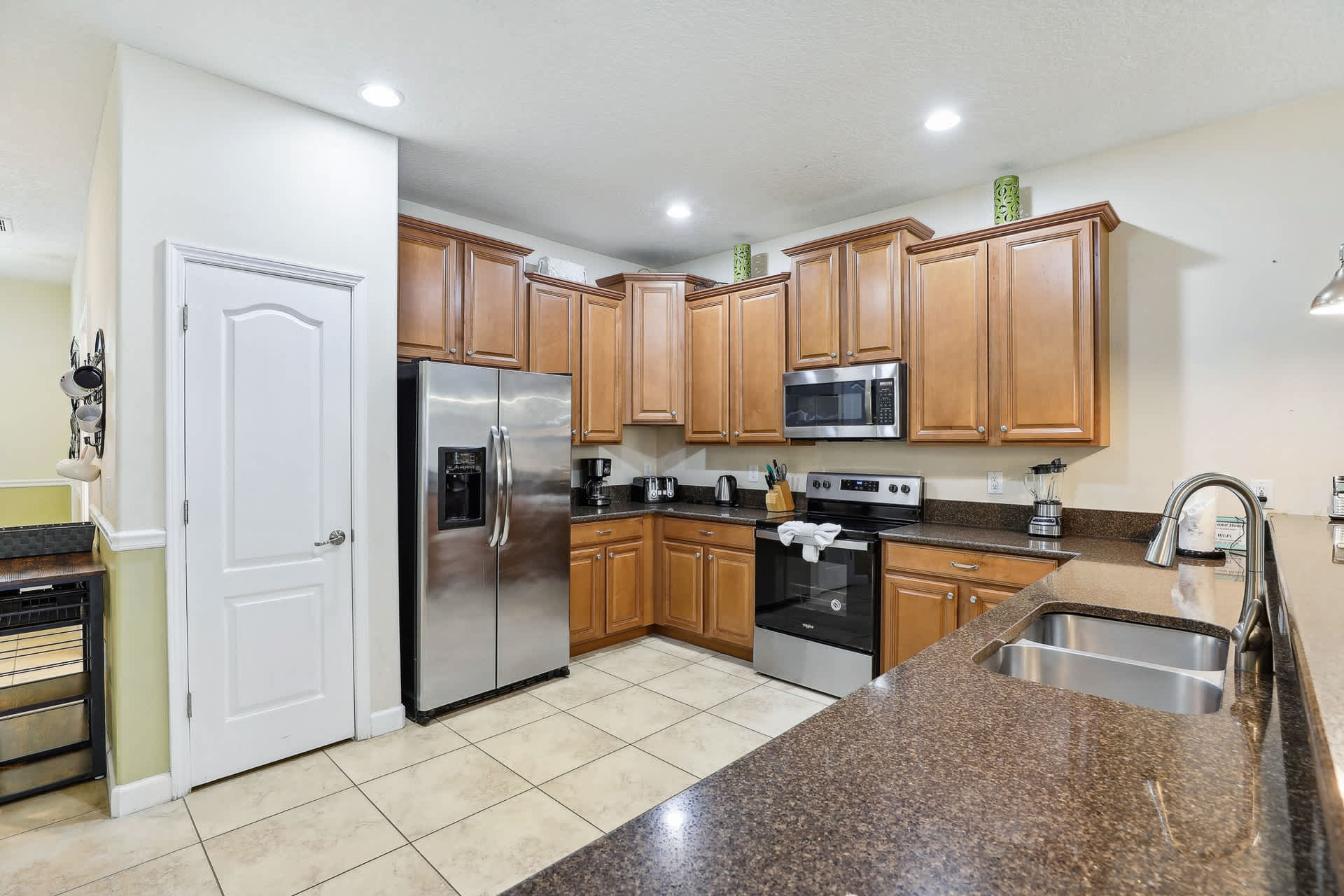 Fully equipped kitchen with silver appliances