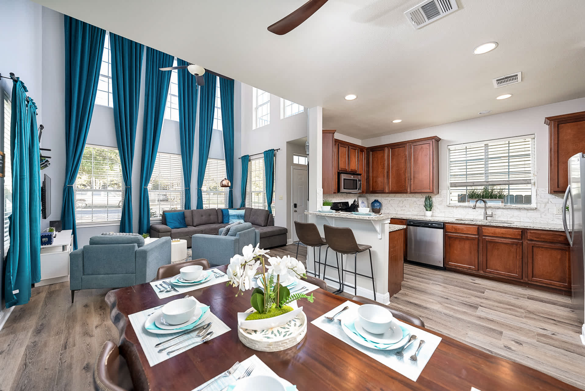 Open-layout dining, kitchen and living area