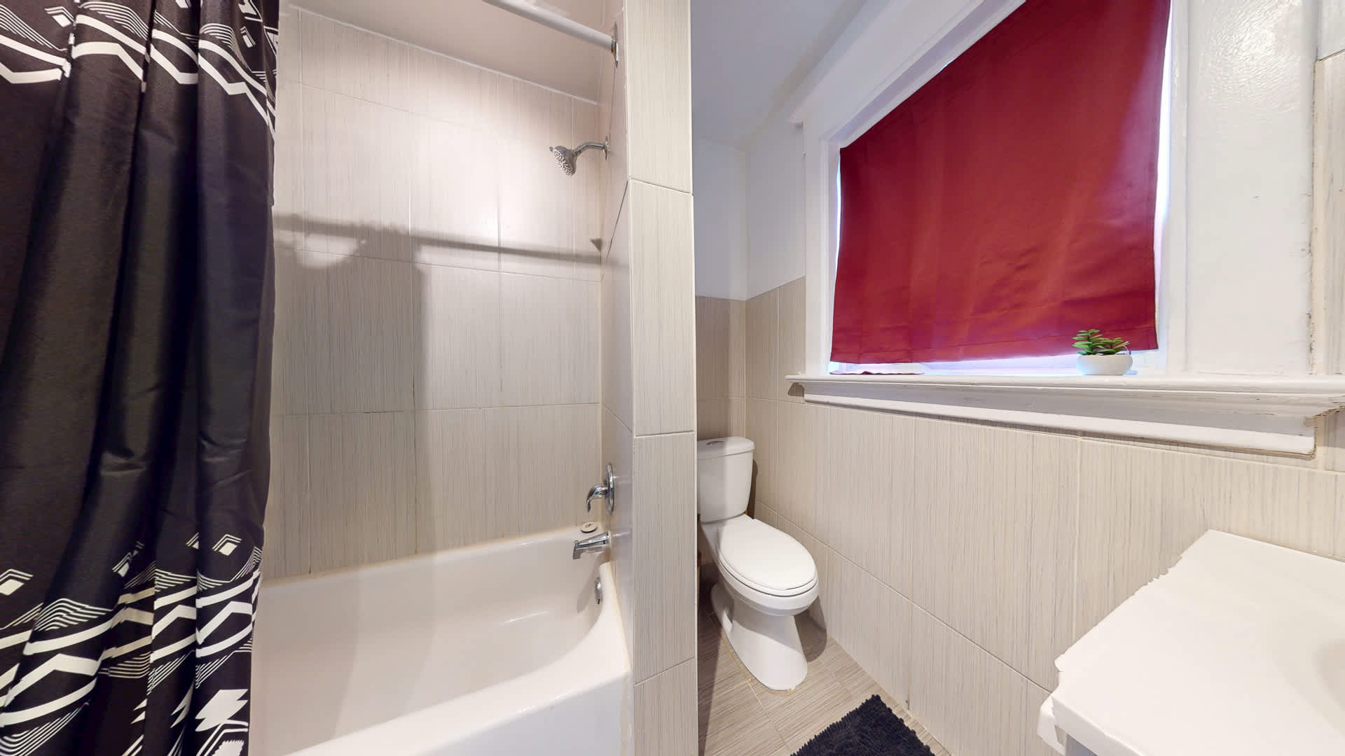 Full Bathroom with Combined Shower and Bathtub