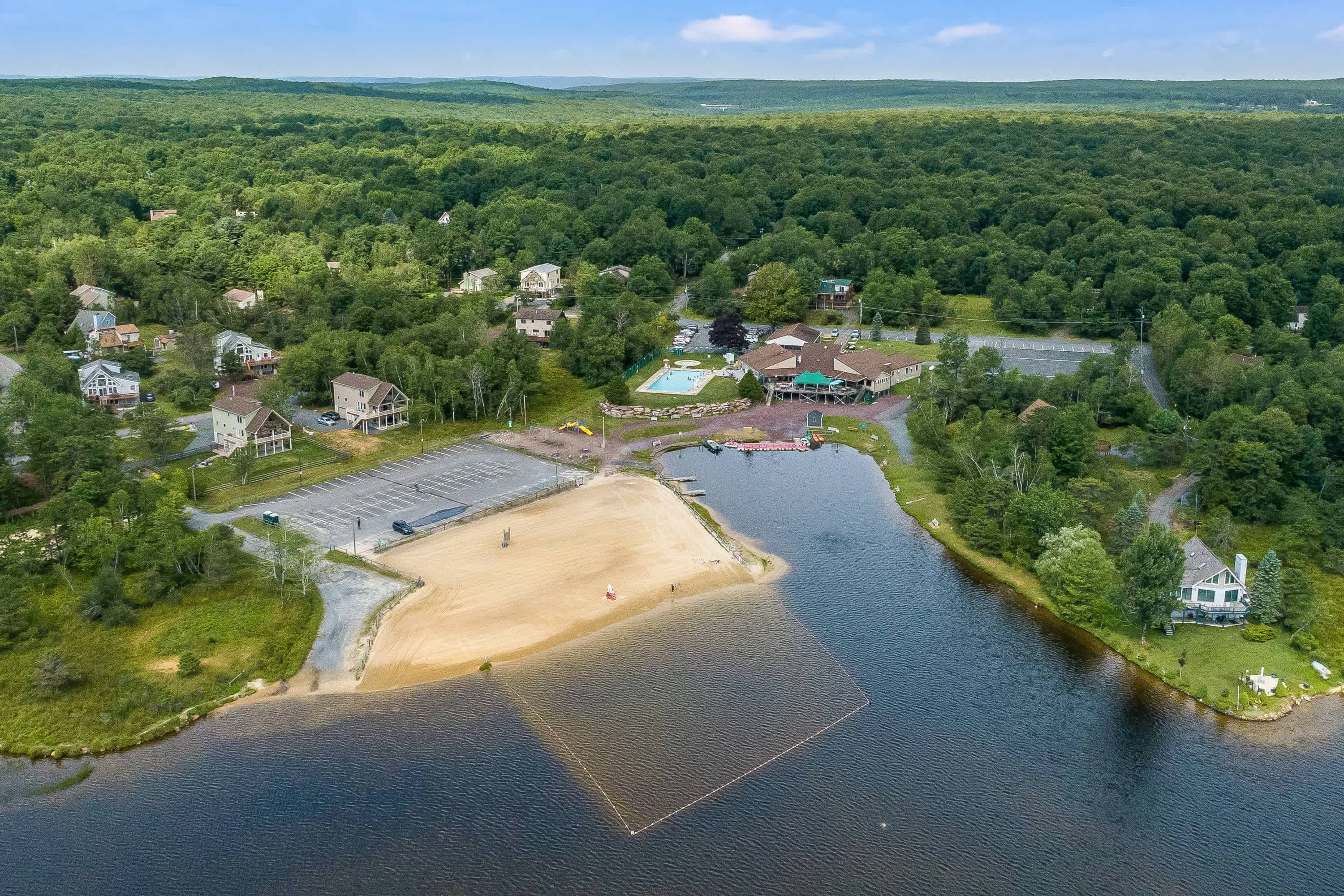 Enjoy the Towamensing Trails resort amenities - beach, lake, outdoor pool, and more!