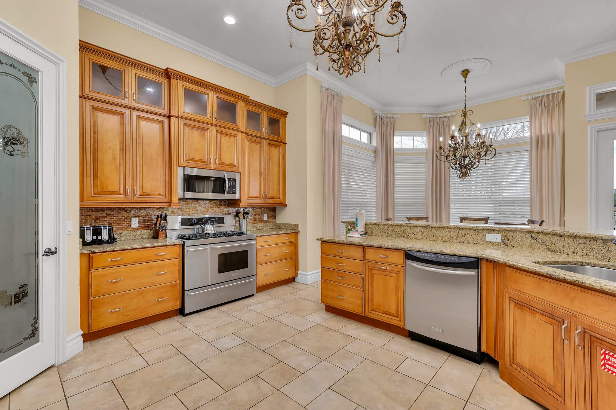 Whip up delicious meals in this spacious and fully equipped kitchen. Perfect for creating culinary masterpieces and family feasts