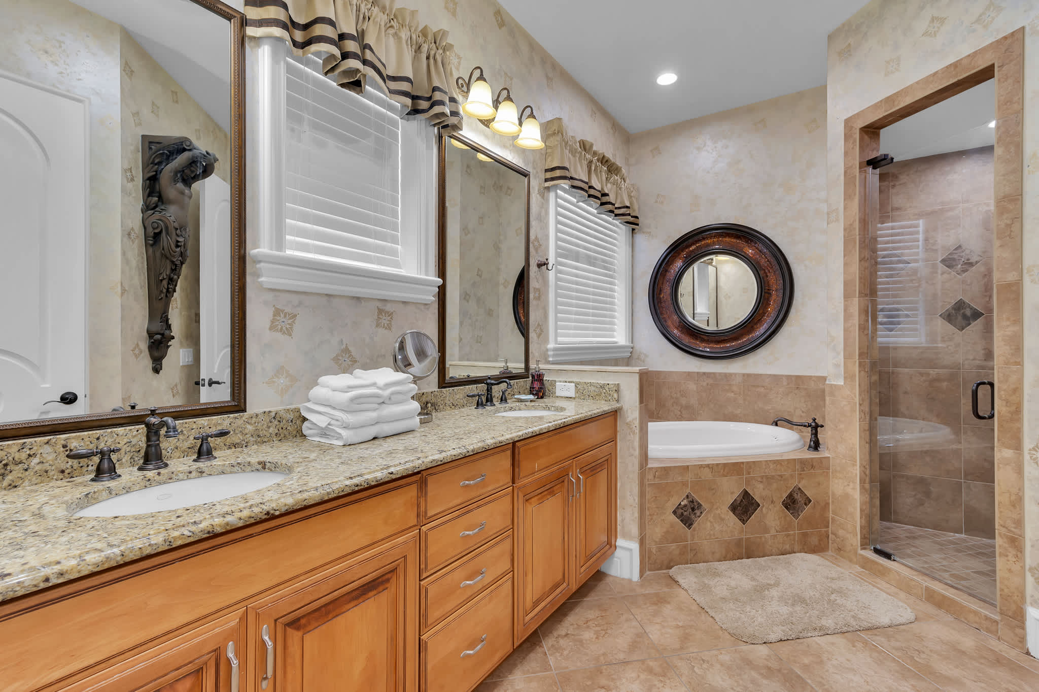 Indulge in luxury with spa-like bathroom. This elegant retreat is perfect for relaxation and rejuvenation - Queen full bathroom