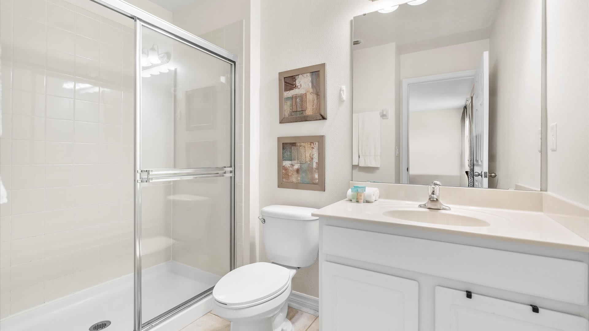 Full en-suite bathroom with standing shower