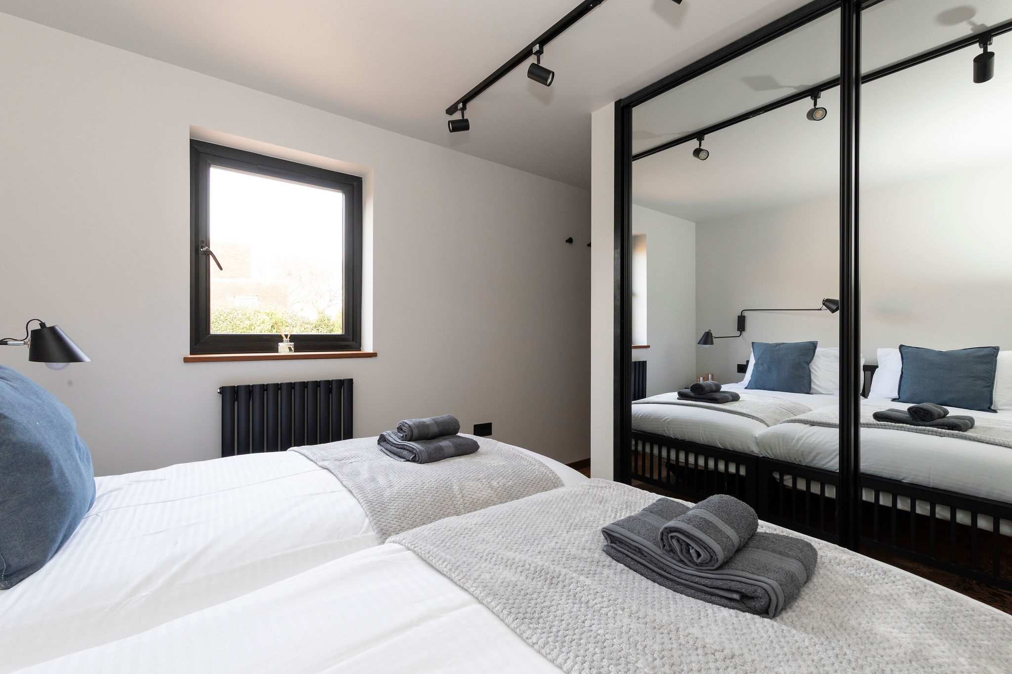 Large double mirrored wardrobe for all your belongings.