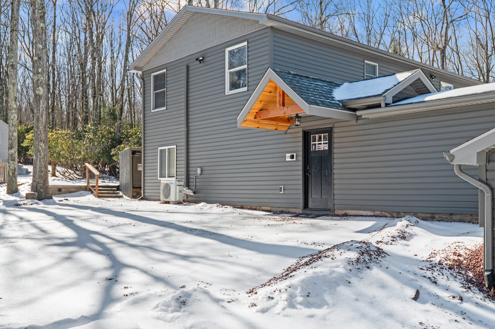 Cabin Style with Room to Roam
A full view of the home shows off its size, style, and the peaceful wooded lot it's nestled on.
