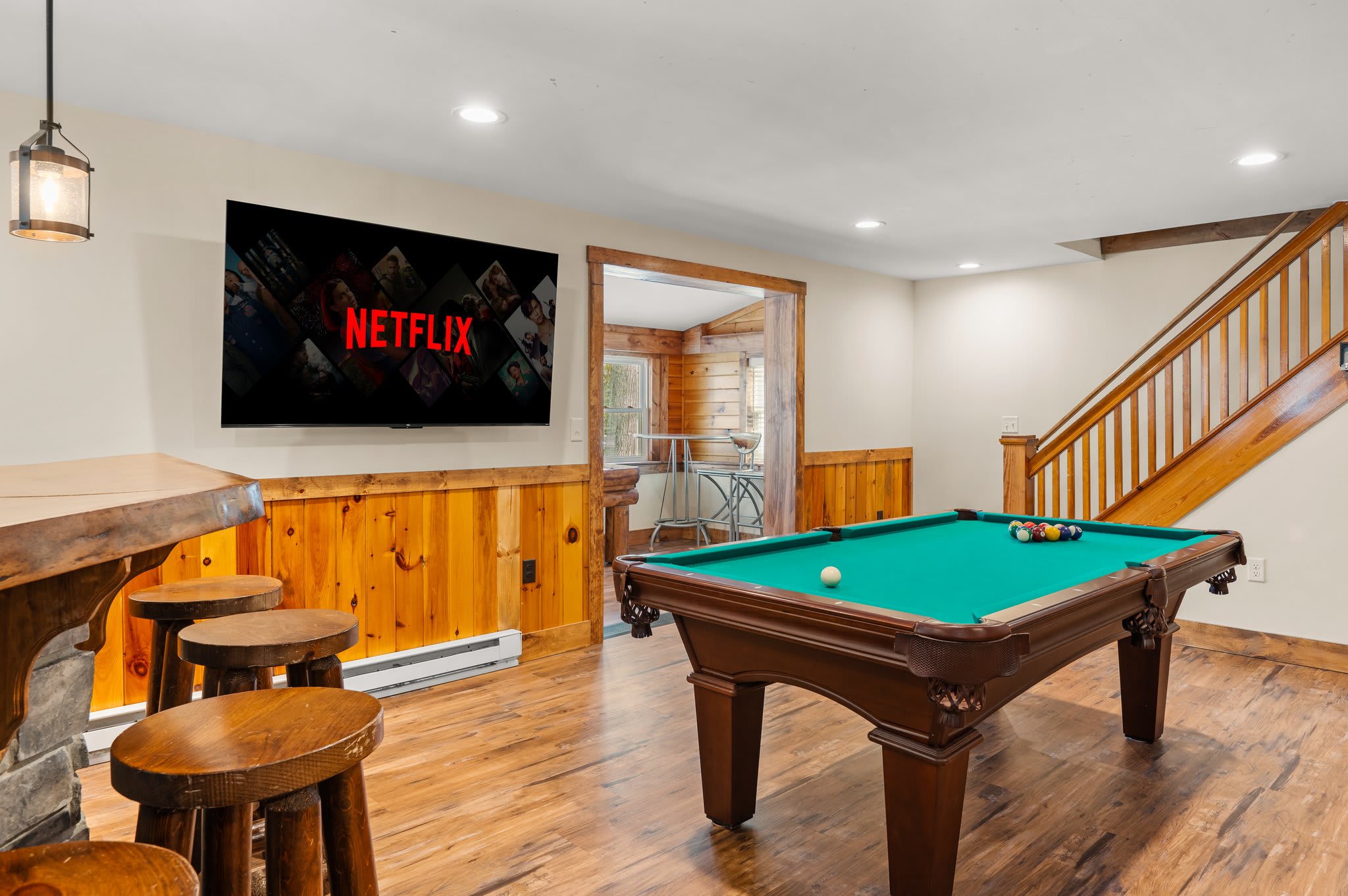 Game Room with a View
Catch a show or play a round of pool in this lower-level rec space designed for good times.