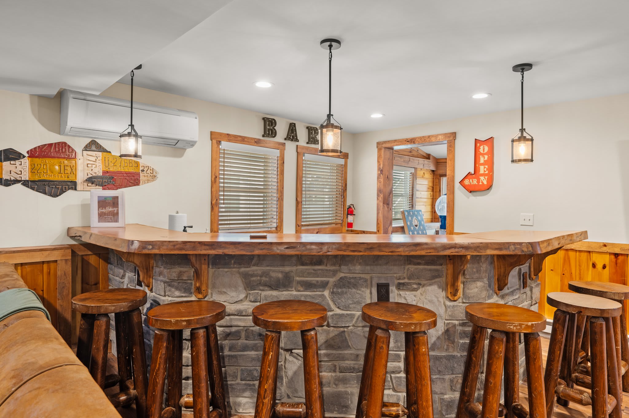 Rustic Bar Hangout
Pull up a stool and enjoy drinks, snacks, or late-night laughs at this custom log bar setup.