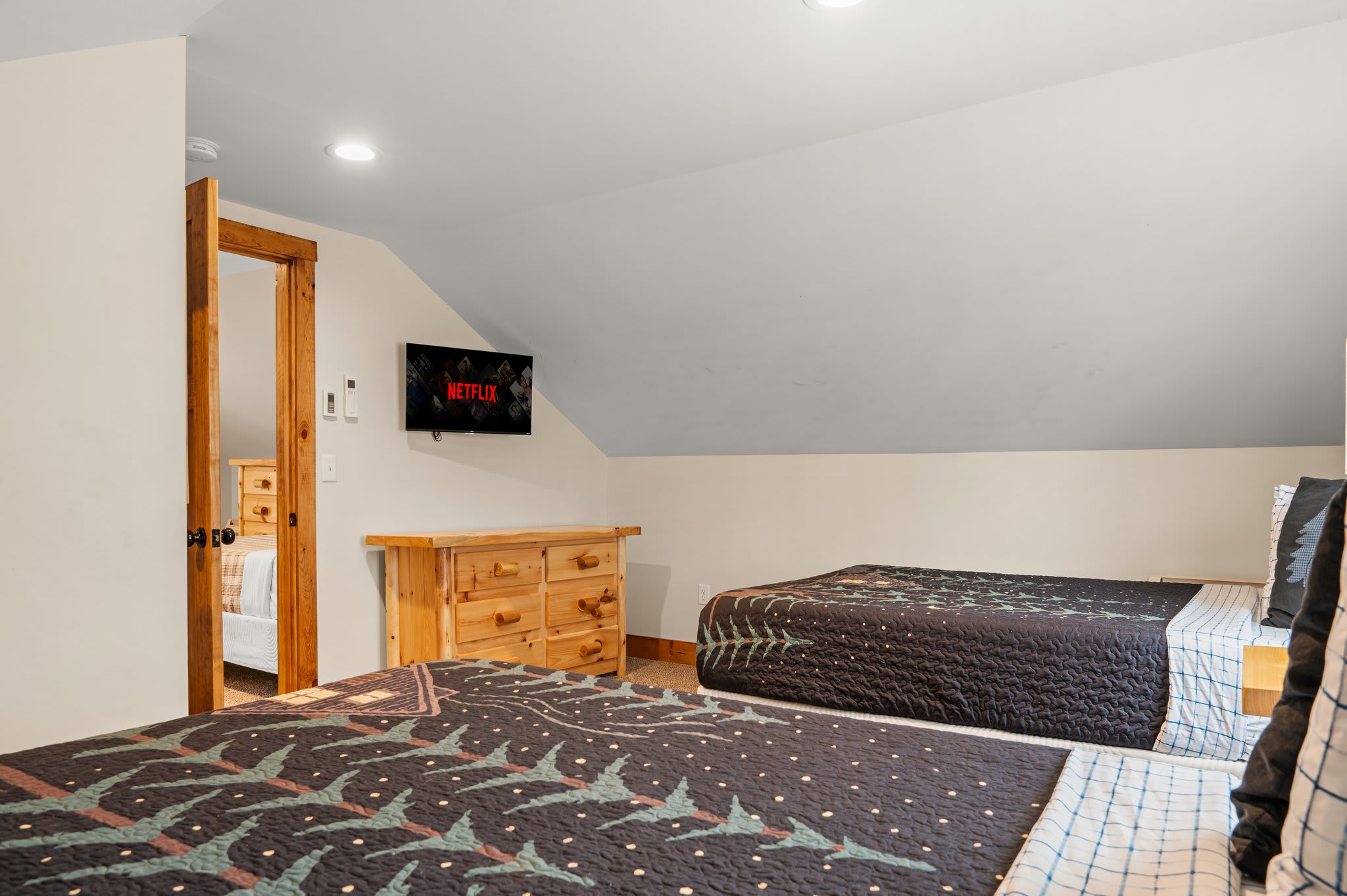 Sleep and Stream
A tucked-away retreat with comfy bedding, personal TV, and plenty of space to recharge.