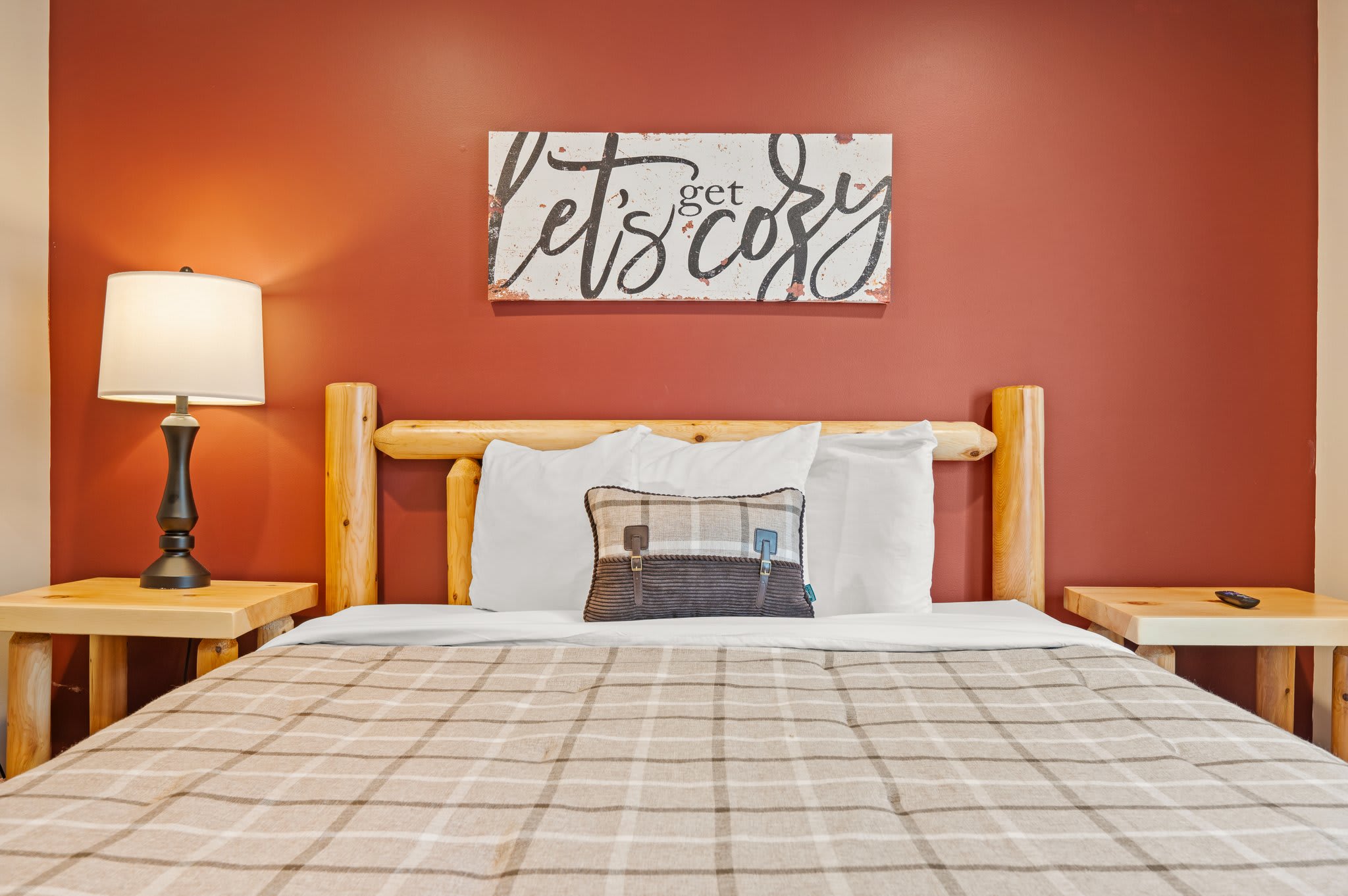 Welcome to Cozy
Soft lighting, simple decor, and a comfy bed make this bedroom feel like a personal retreat.