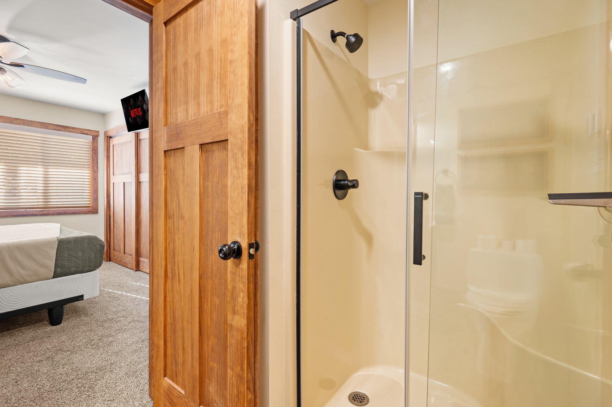 Modern Rustic Shower
Step into this sleek walk-in shower with warm tones and clean lines for a refreshing rinse.