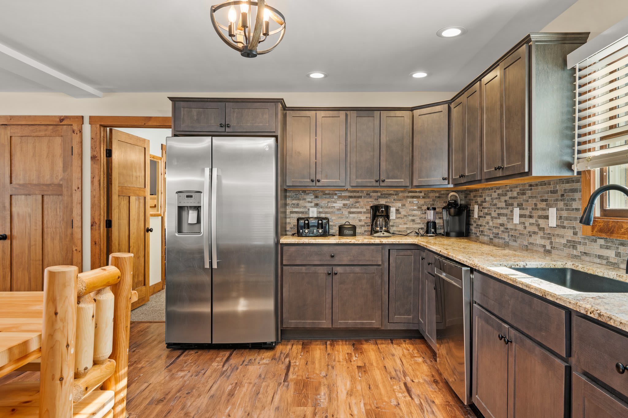Rustic Modern Kitchen
Equipped with stainless steel appliances, sleek cabinetry, and a welcoming layout for all your cooking needs.