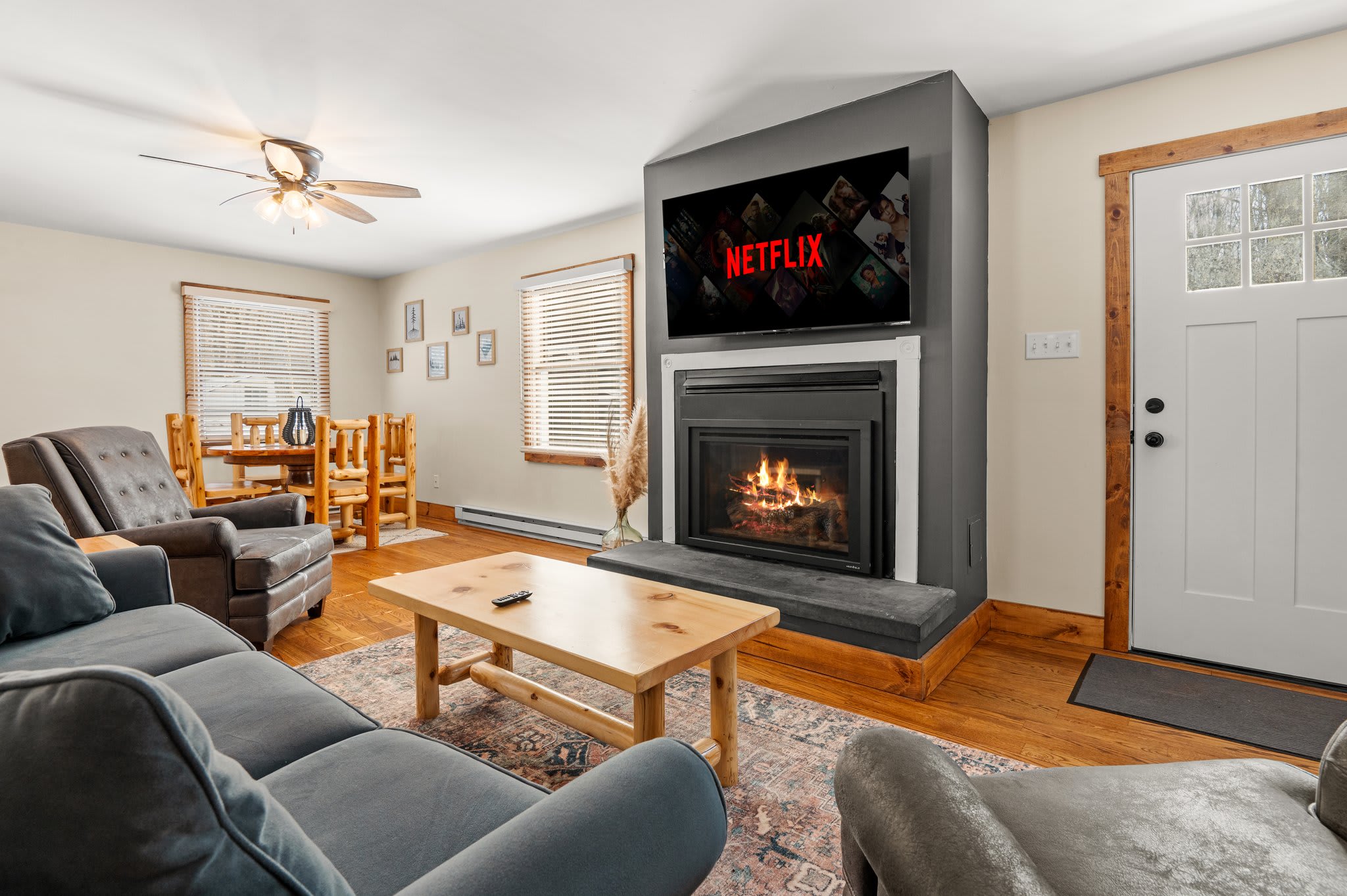 Inviting and Open
Whether you're reading by the fire or watching a show, this living space is warm, bright, and welcoming.